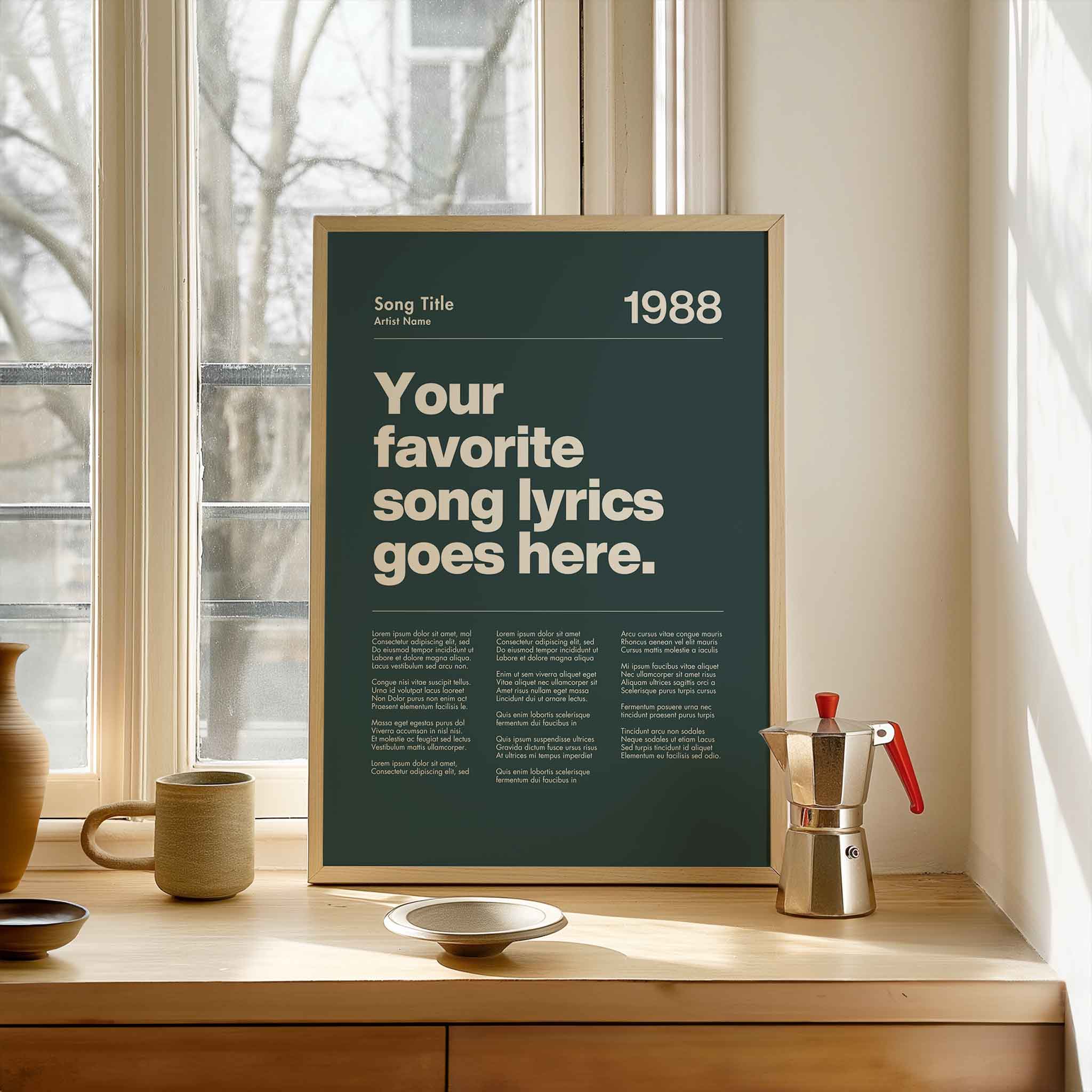 a poster on a window sill next to a cup and saucer