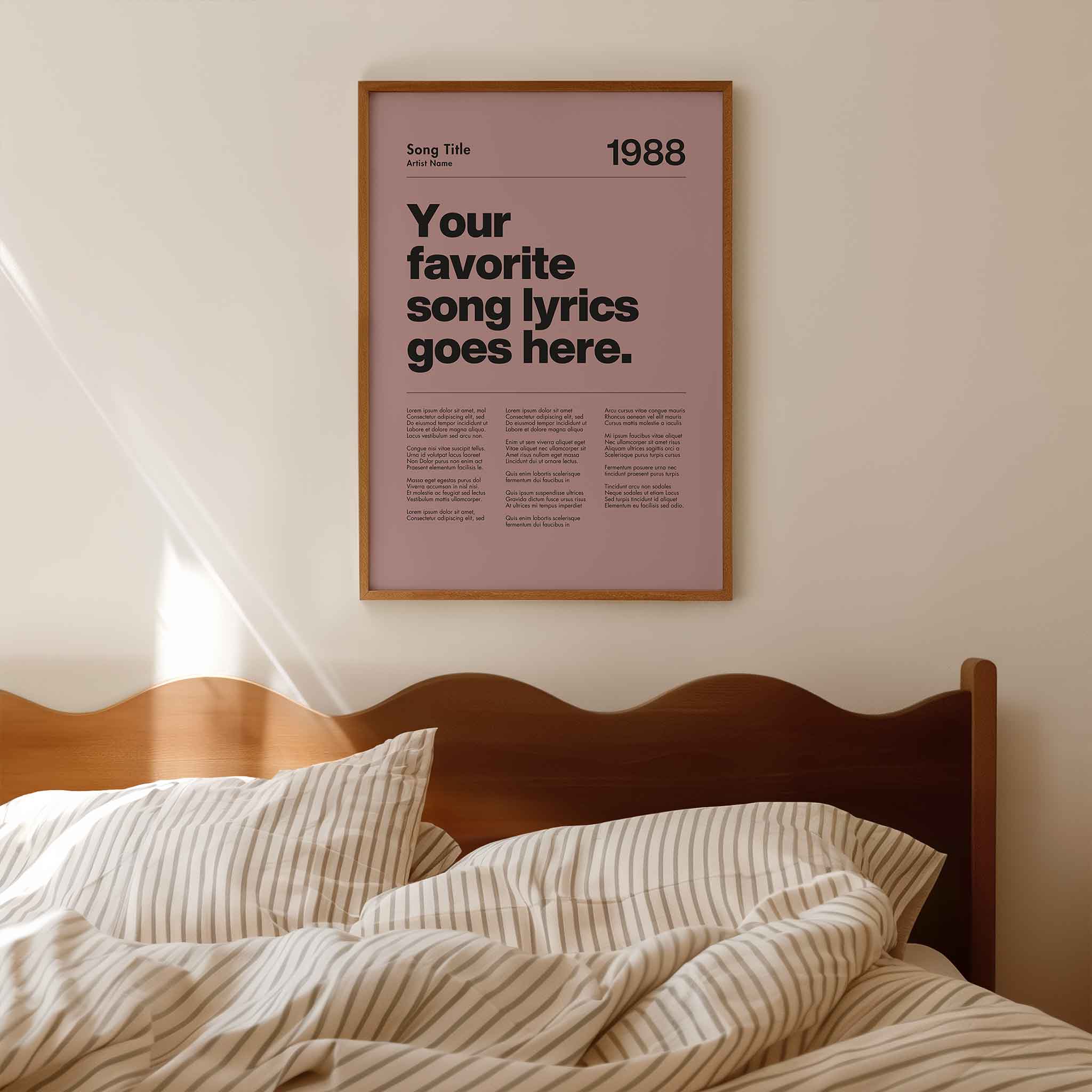 a poster hanging on the wall above a bed