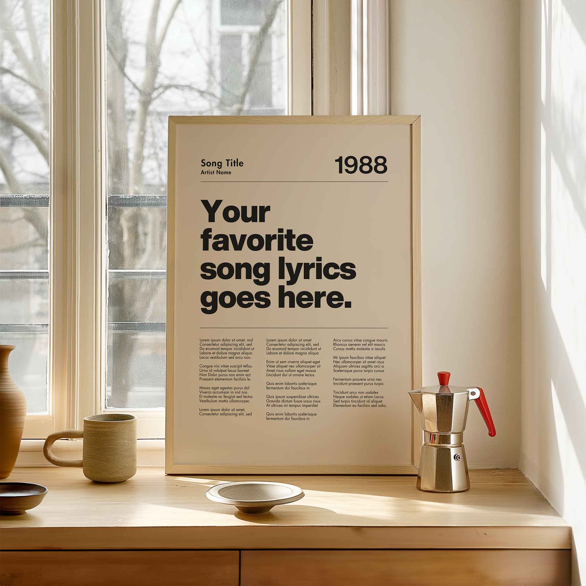 a poster on a window sill next to a cup and saucer