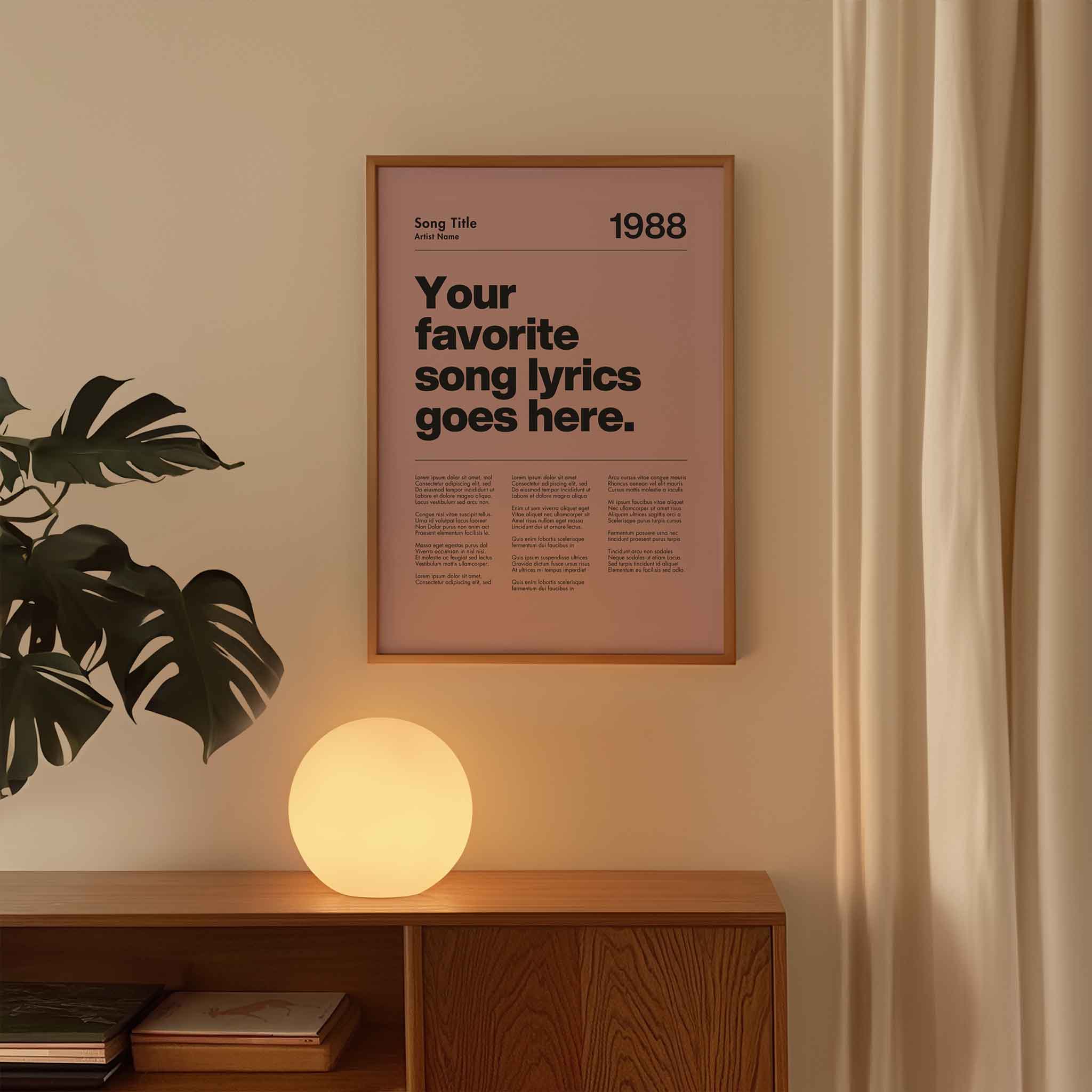 a poster hanging on a wall next to a plant