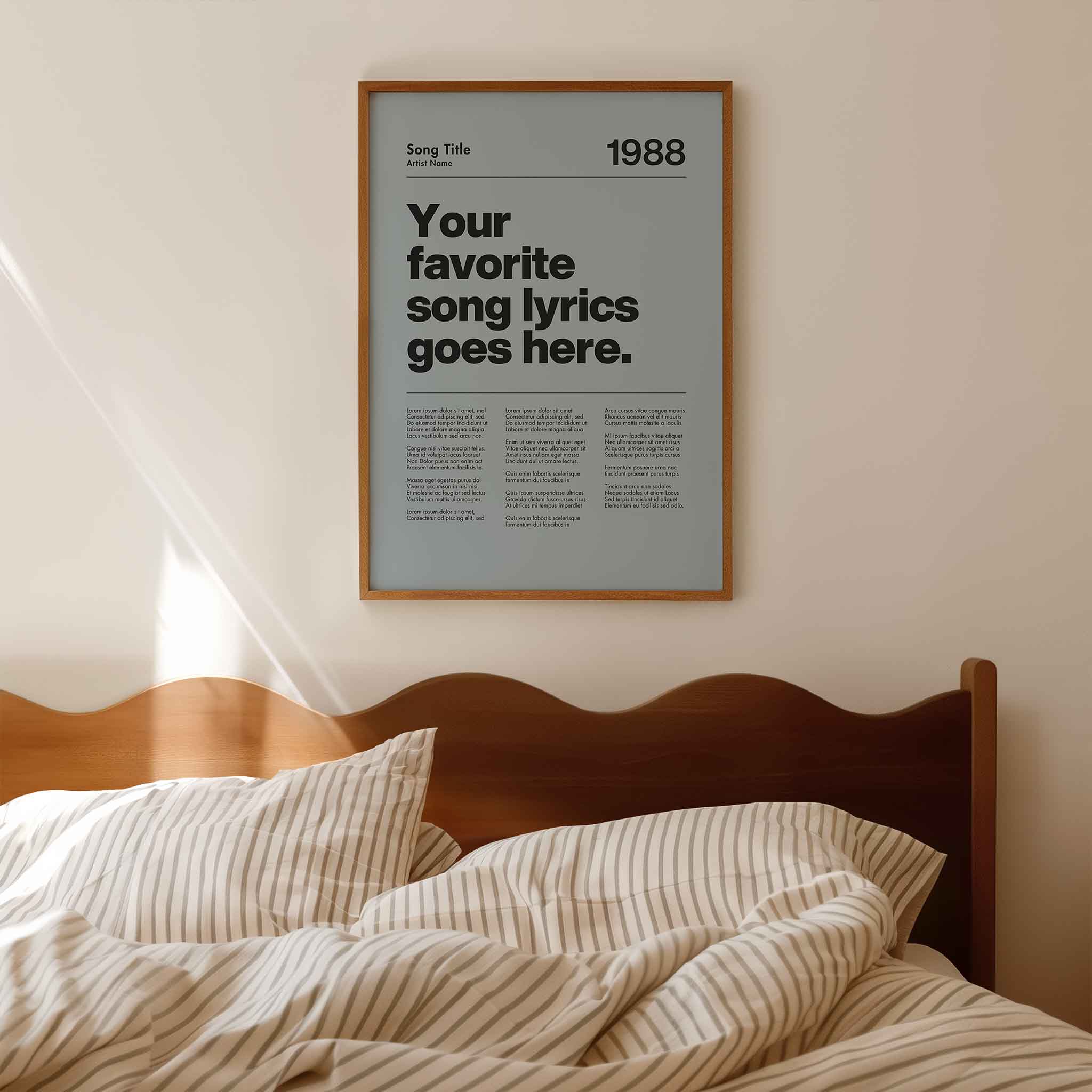 a poster hanging on the wall above a bed
