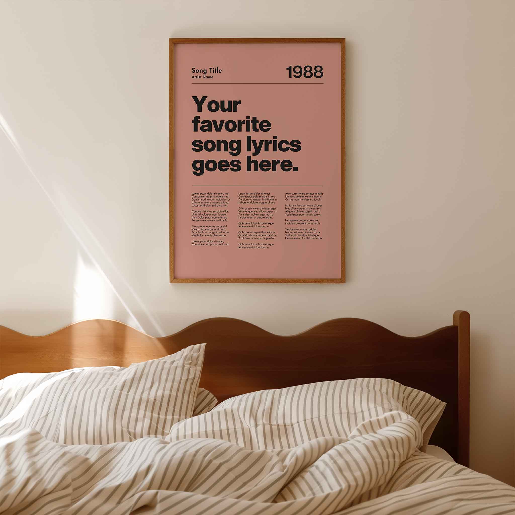 a picture of a bed with a pink poster above it