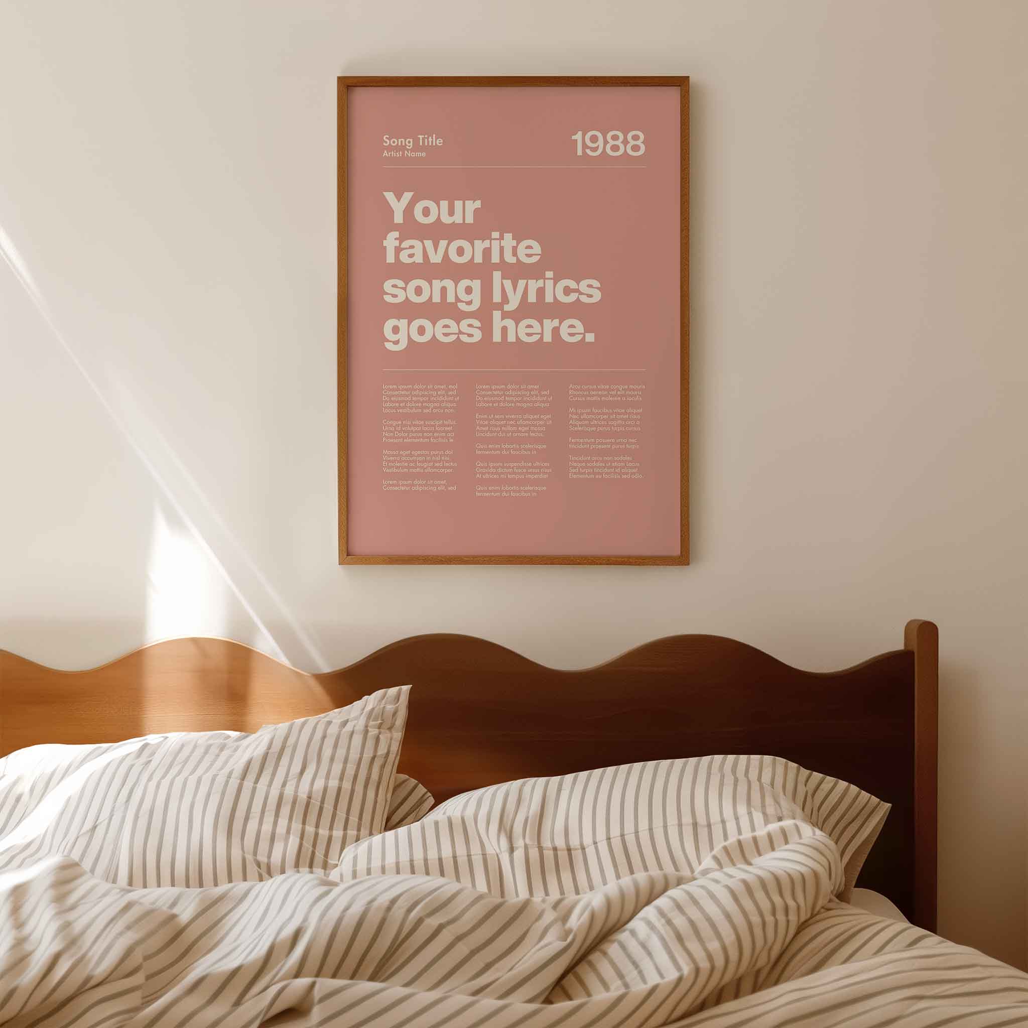a bed with a pink poster above it