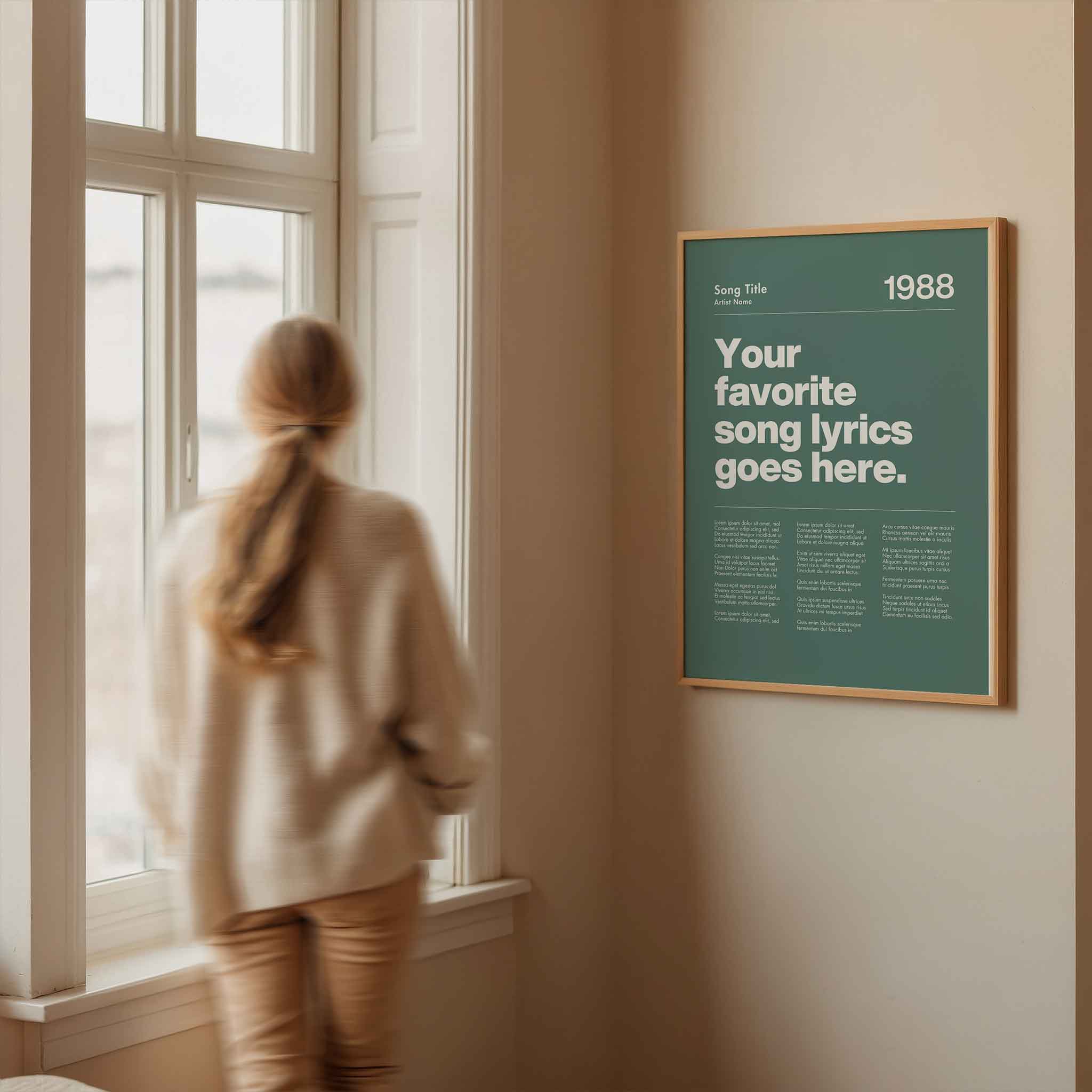 a woman looking out a window at a poster