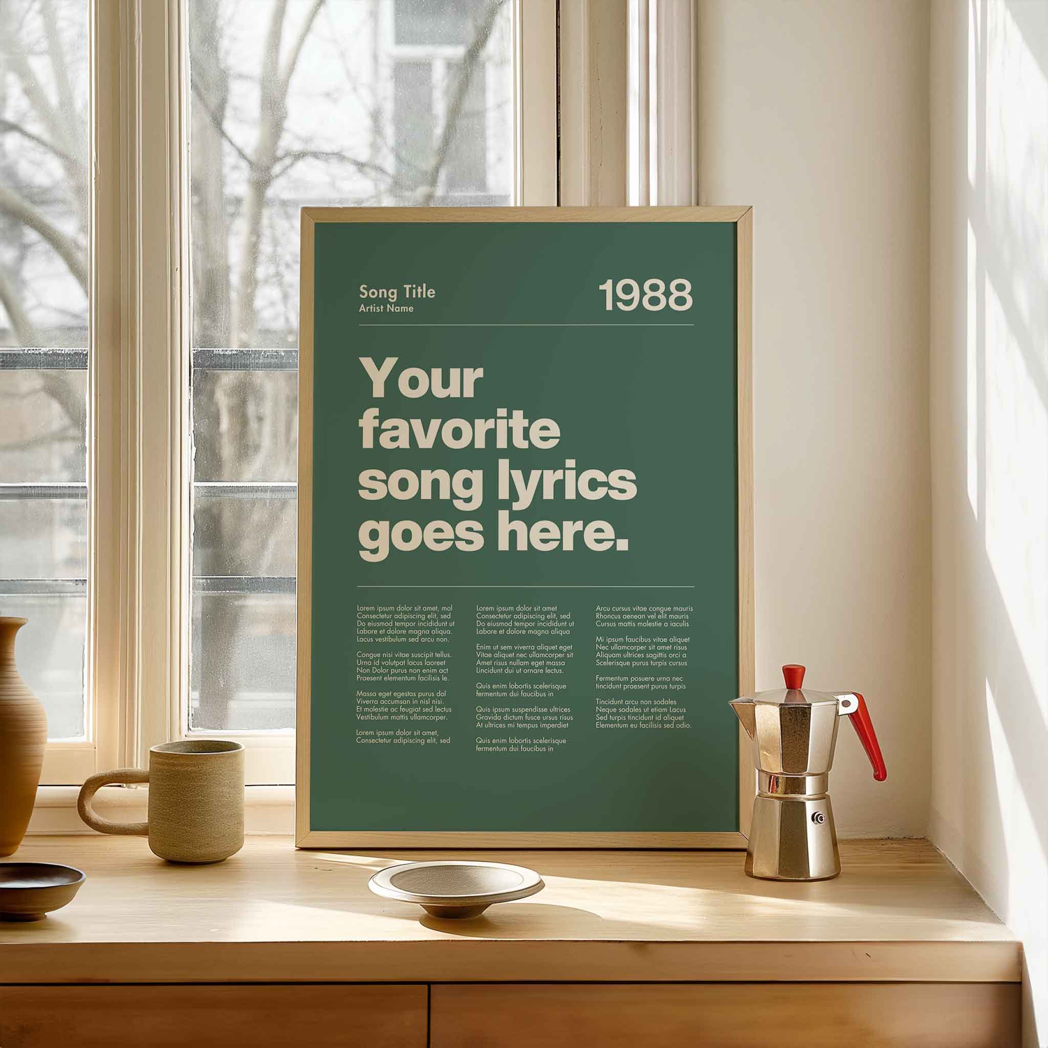a poster on a window sill next to a cup and saucer