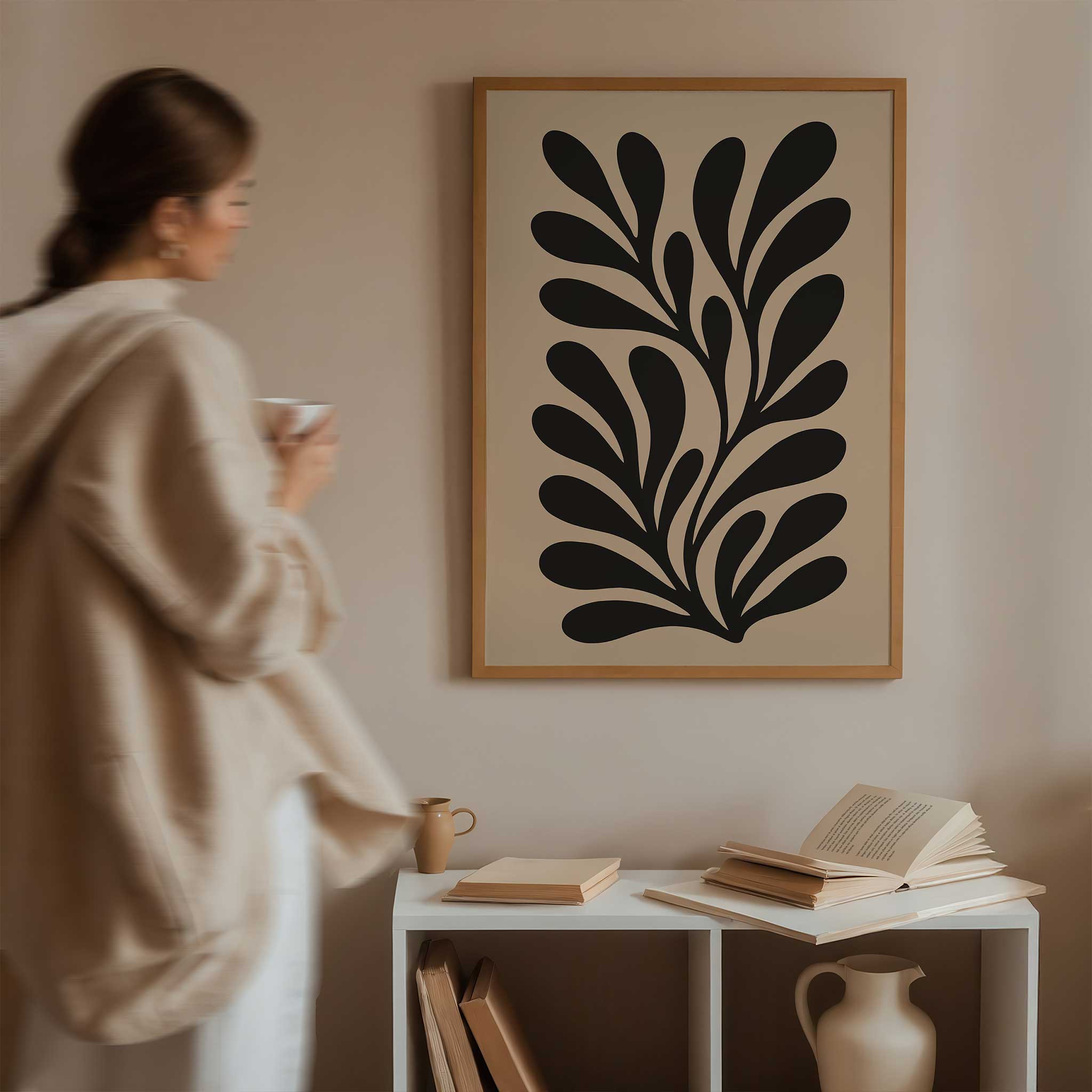 Modern botanical silhouette art of a graceful flowing leaf, a minimalist print titled 'Shadowleaf Flow'.