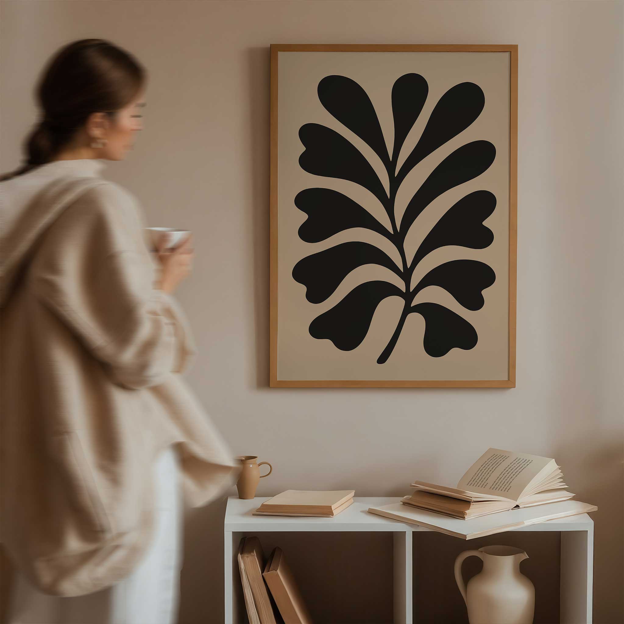A bold, minimalist silhouette print of an oak leaf, calming modern wall art titled 'Bold Oak'.