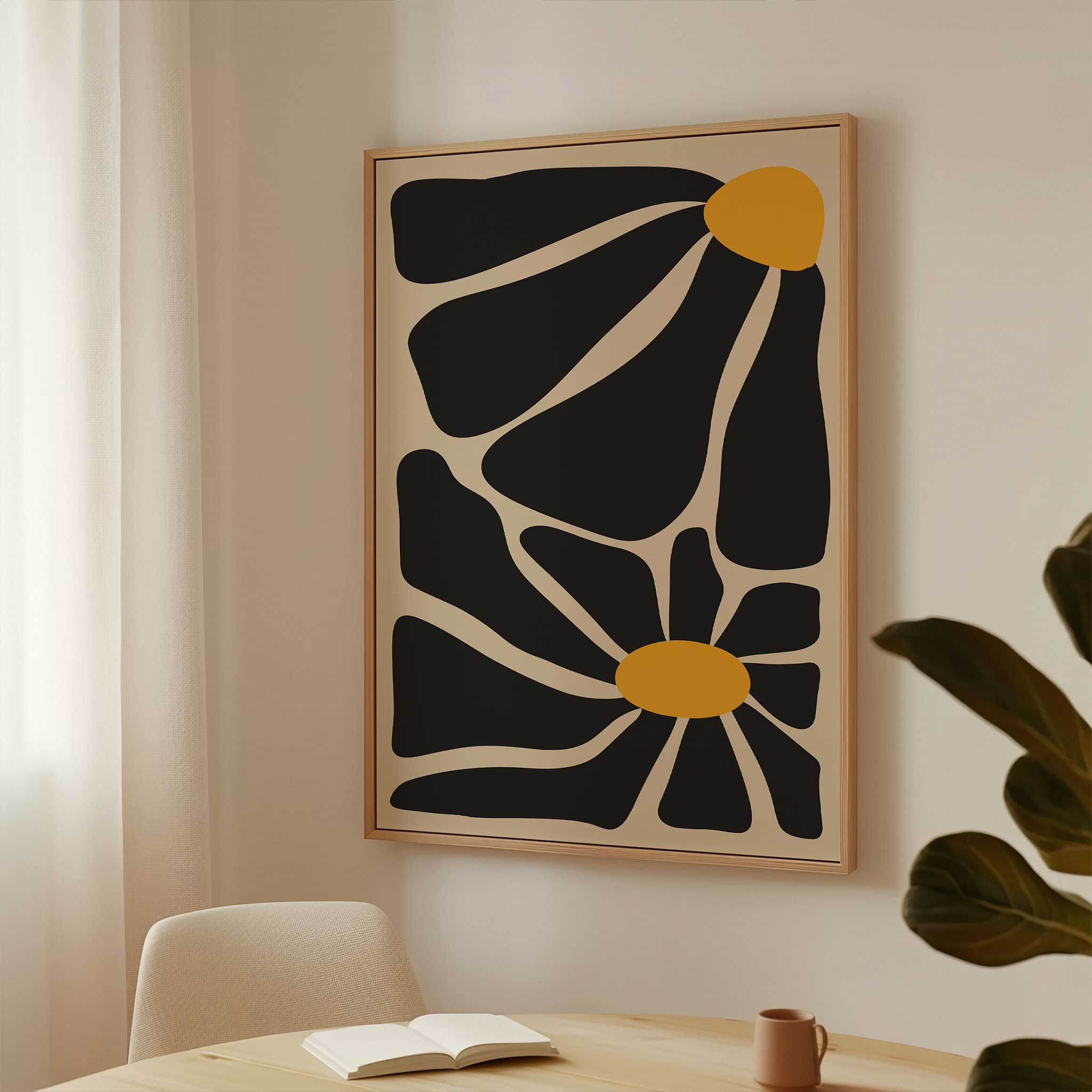 A bold, contemporary abstract print of two flowers with oversized black petals and vivid golden centers.