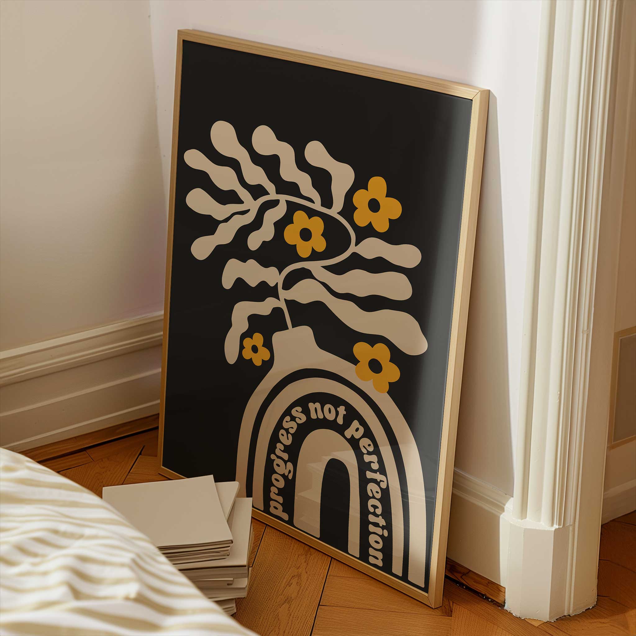 A motivational print blending playful floral shapes and a retro vase with the quote 'Progress Not Perfection'.