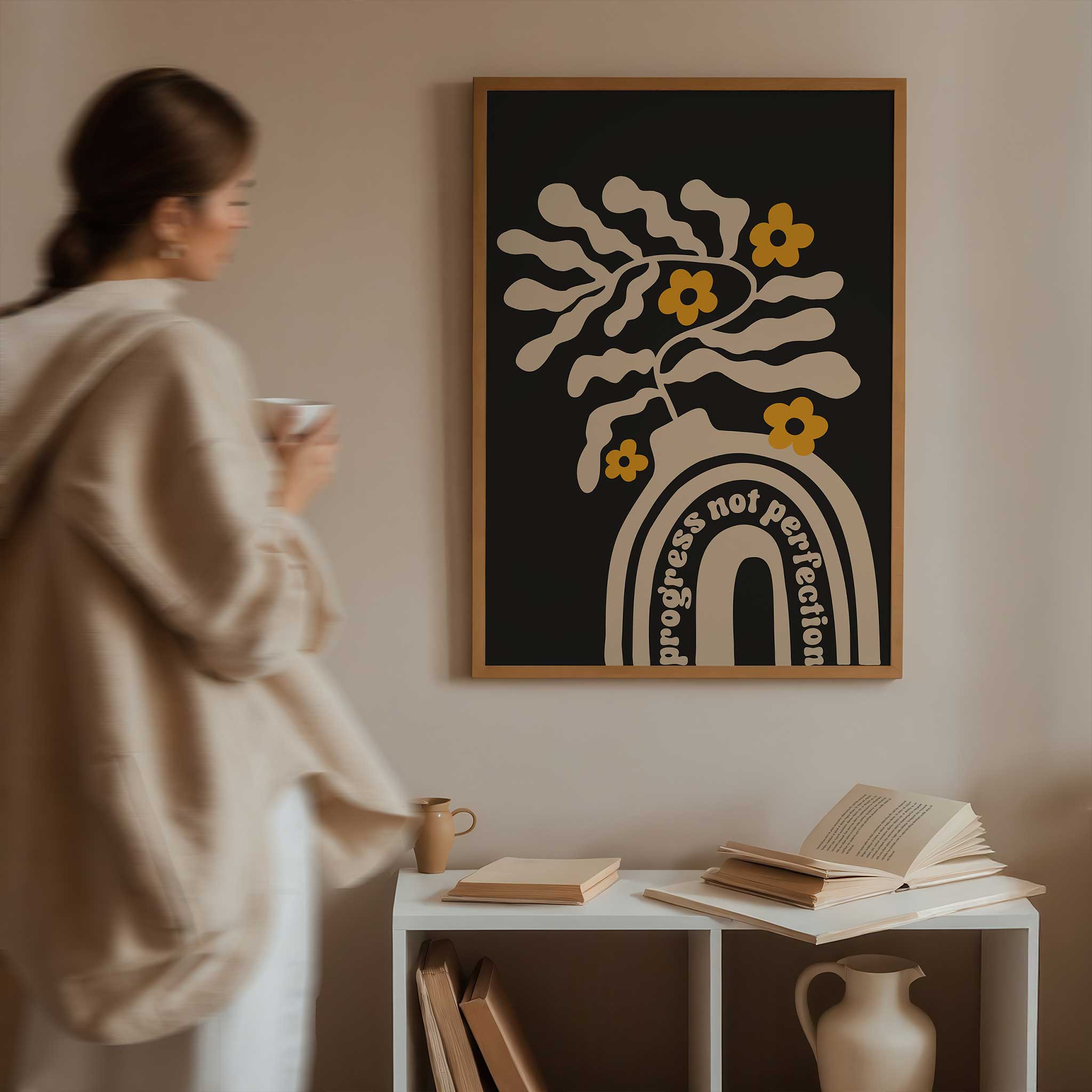 A motivational print blending playful floral shapes and a retro vase with the quote 'Progress Not Perfection'.