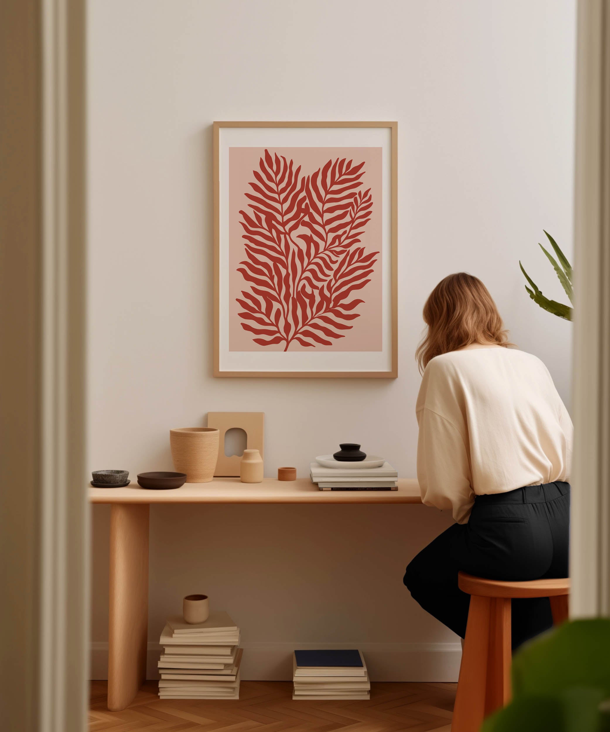 Vibrant red botanical 'Red Plants Print,' modern wall art for a bold living room aesthetic.