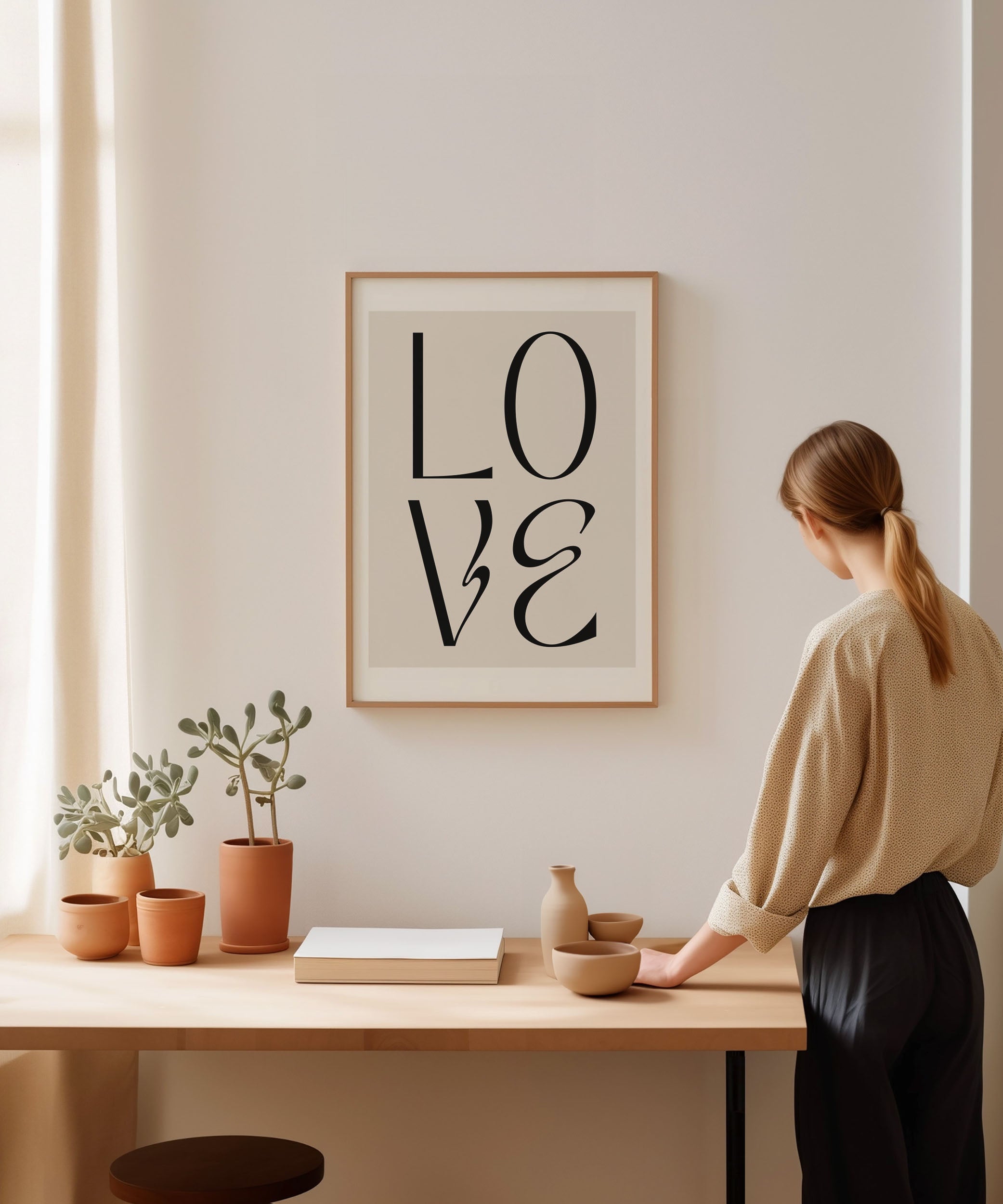 Love' typography design, romantic modern wall art for a heartfelt living room aesthetic.
