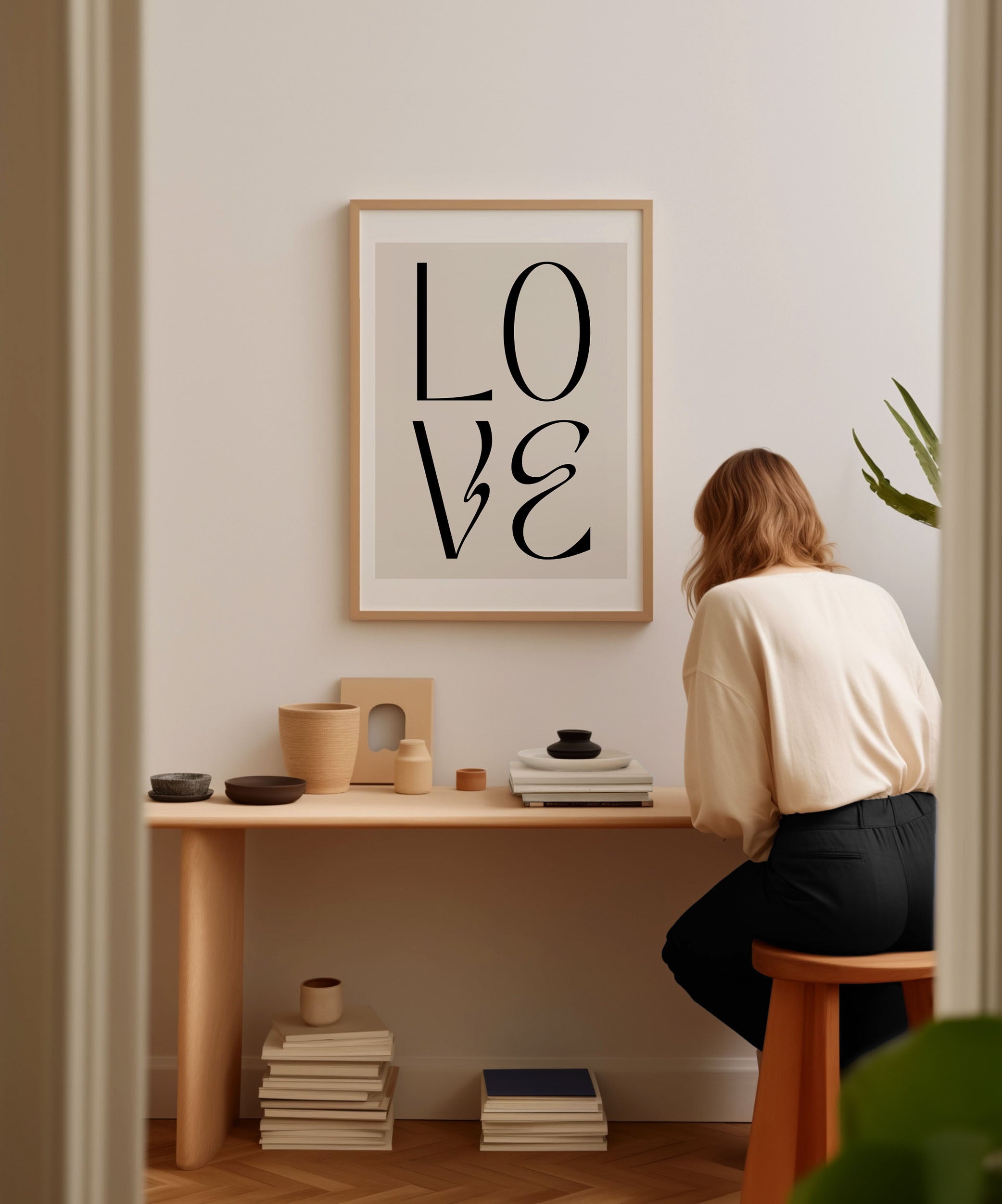 Love' typography design, romantic modern wall art for a heartfelt living room aesthetic.