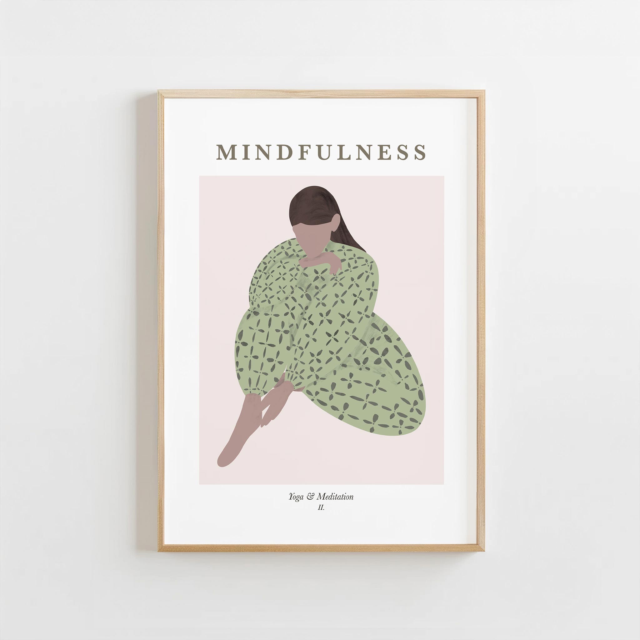 Framed artwork with a woman in a green dress and 'Mindfulness' text on a light background