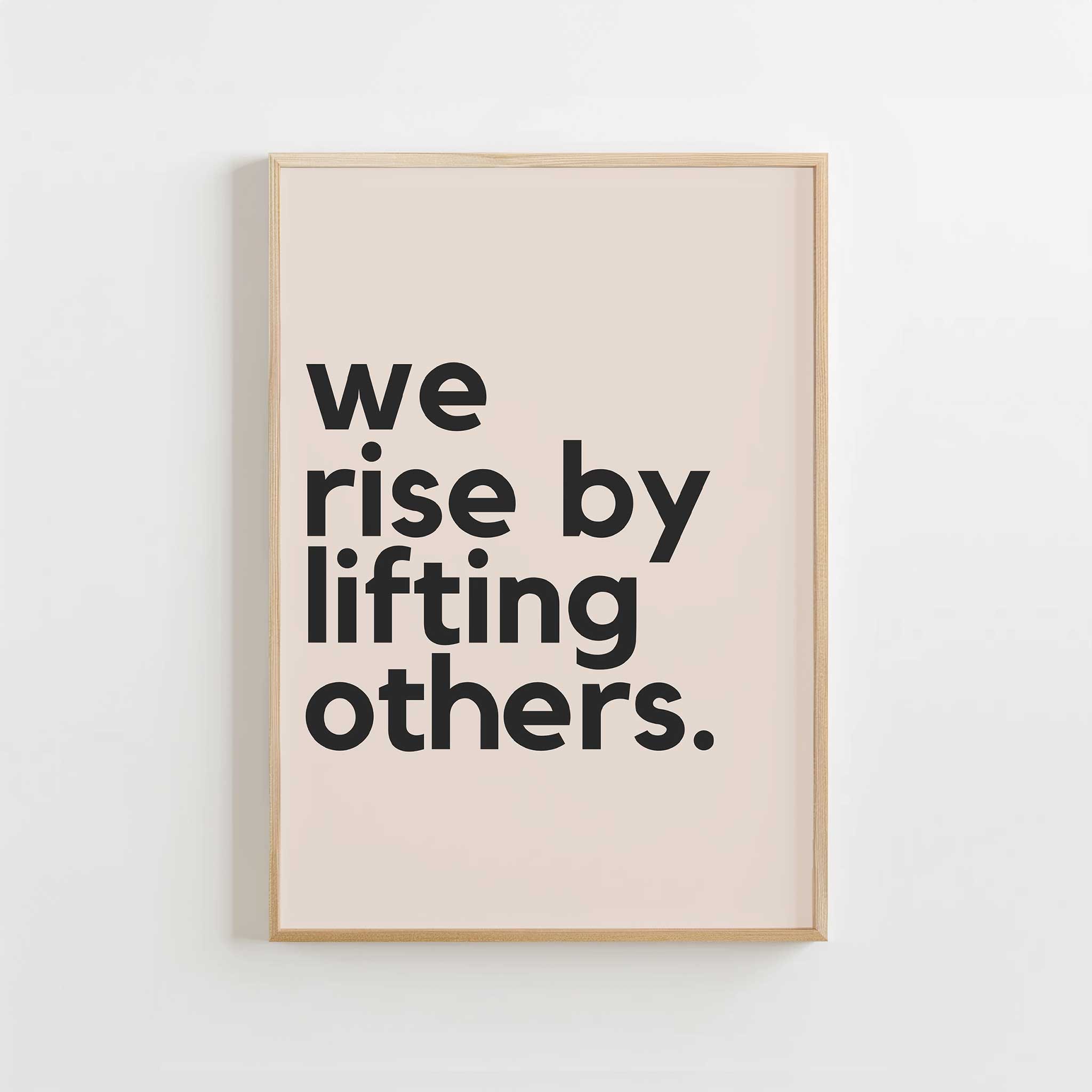 We Rise by Lifting Others' empowering typography, framed wall art print for a kindness aesthetic, titled 'We Rise by Lifting Others'