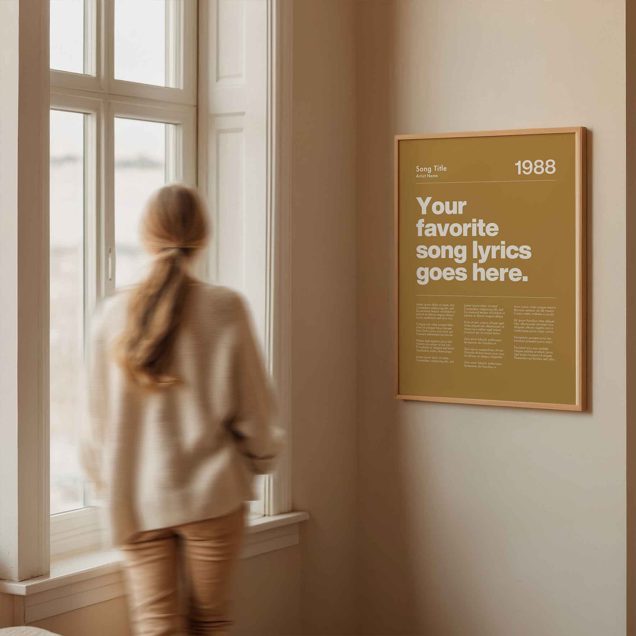 a woman looking out a window at a poster