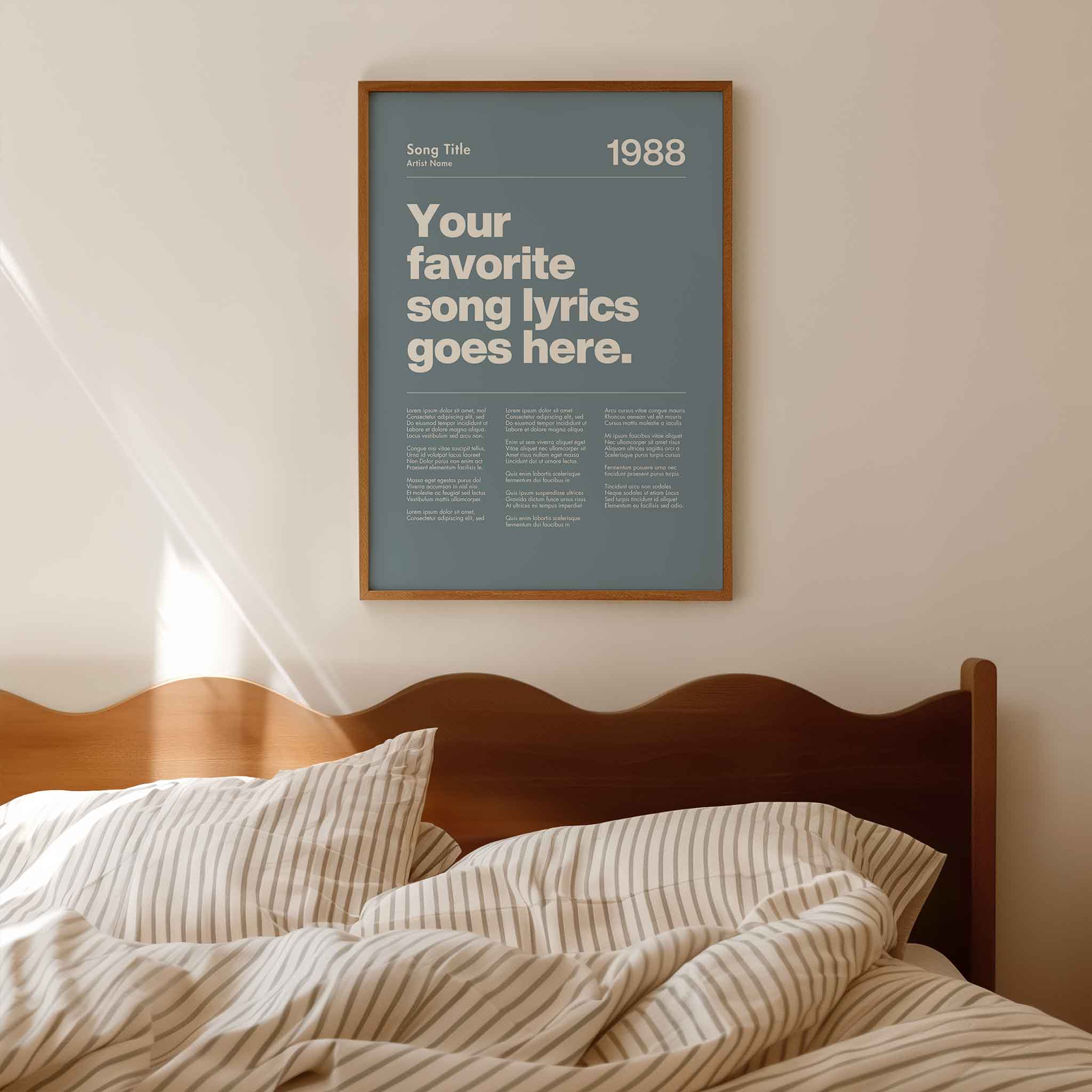 a poster hanging on the wall above a bed