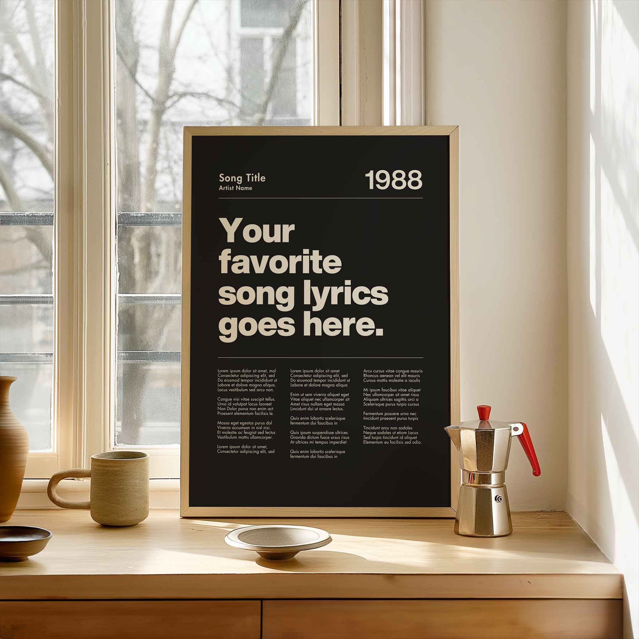 a poster on a window sill next to a cup and saucer