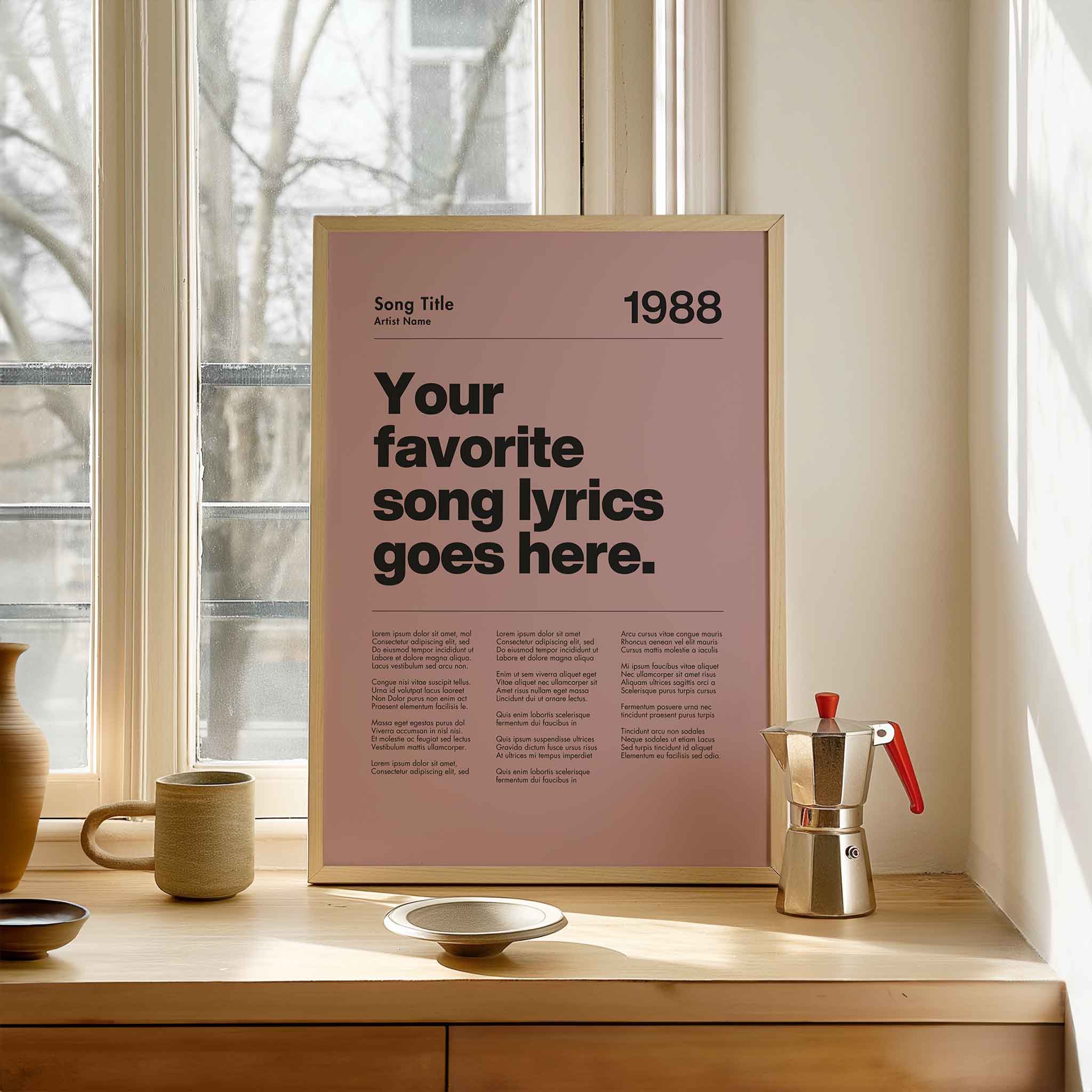 a poster on a window sill next to a cup and saucer