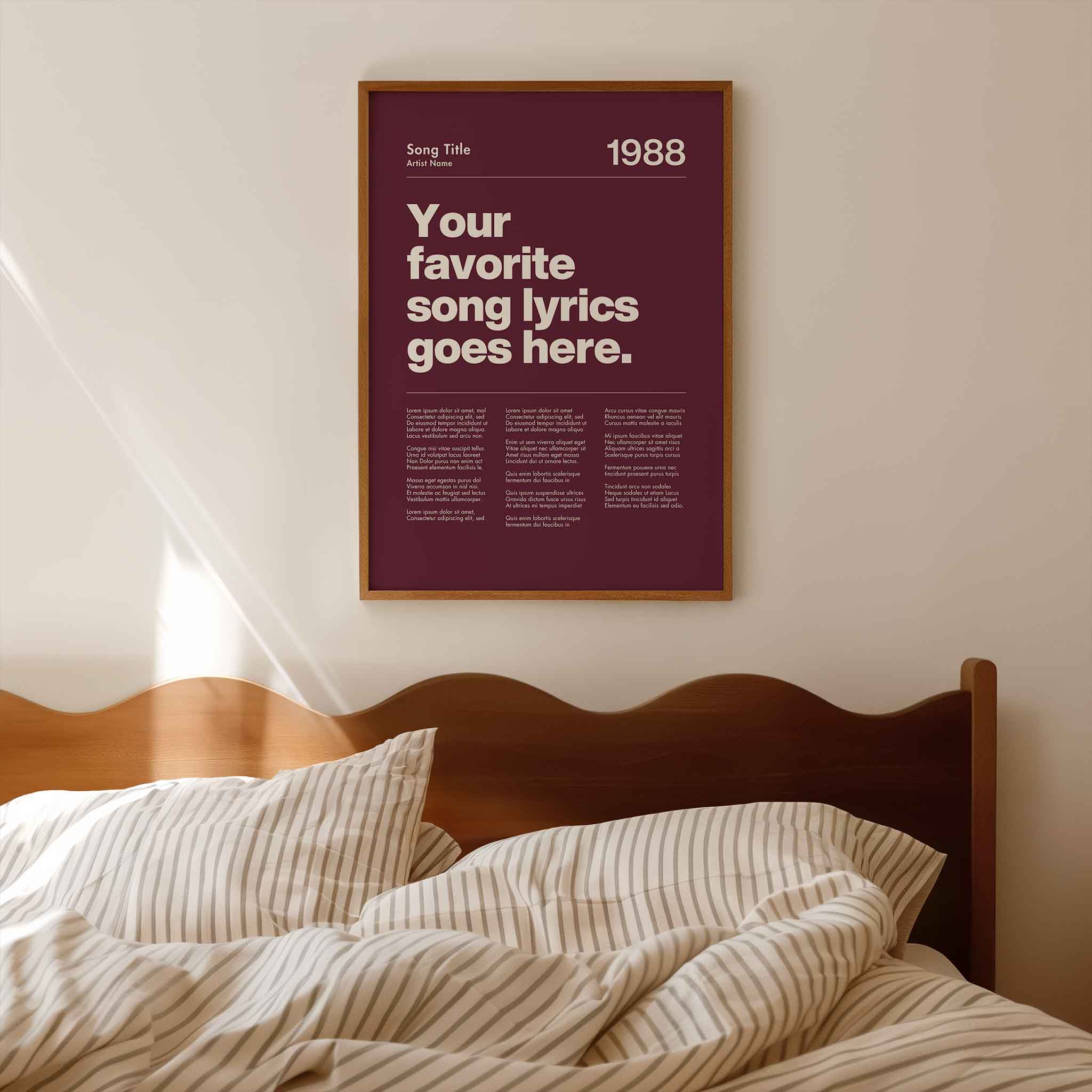 a poster hanging on a wall above a bed