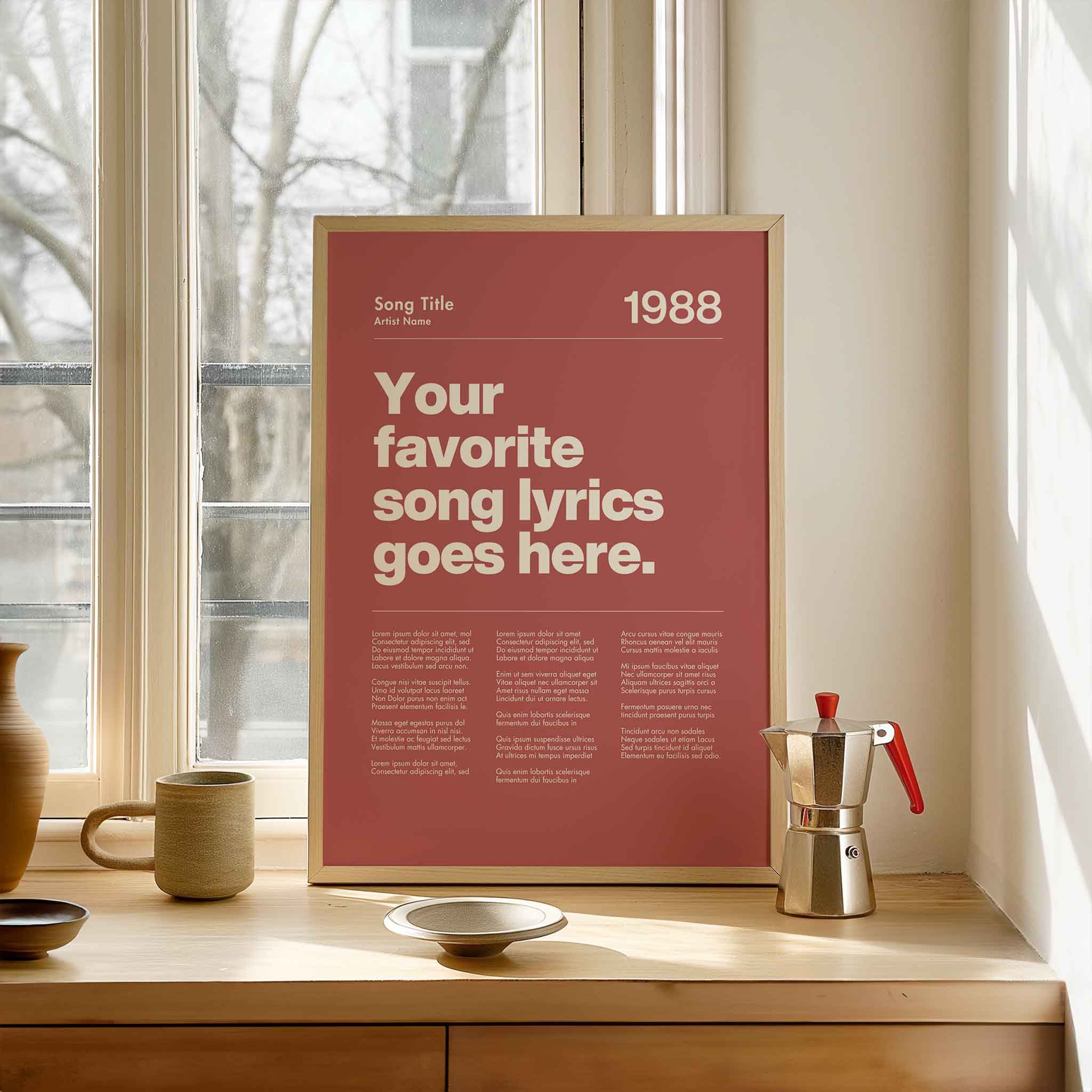 a poster on a window sill next to a cup and saucer