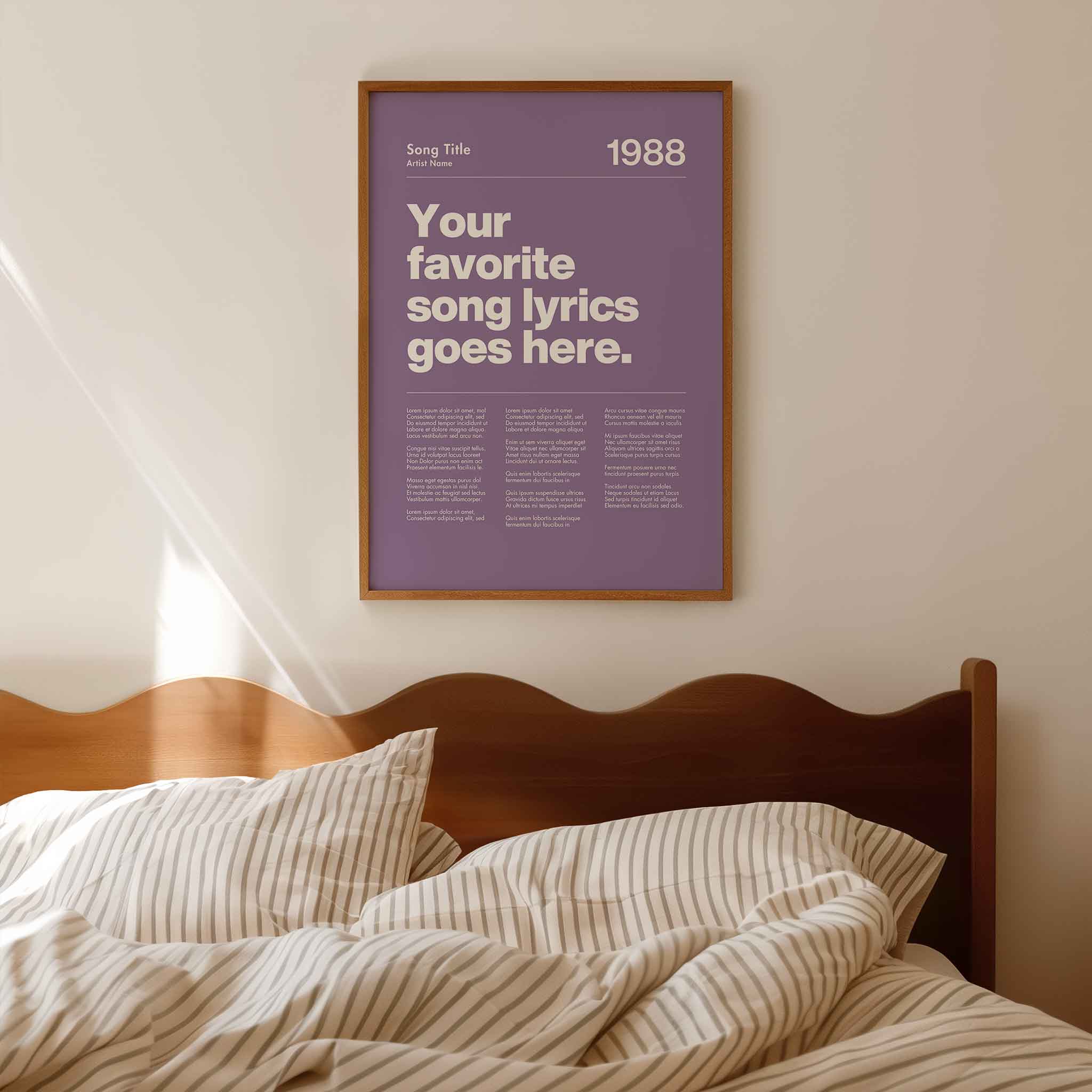 a poster hanging on the wall above a bed