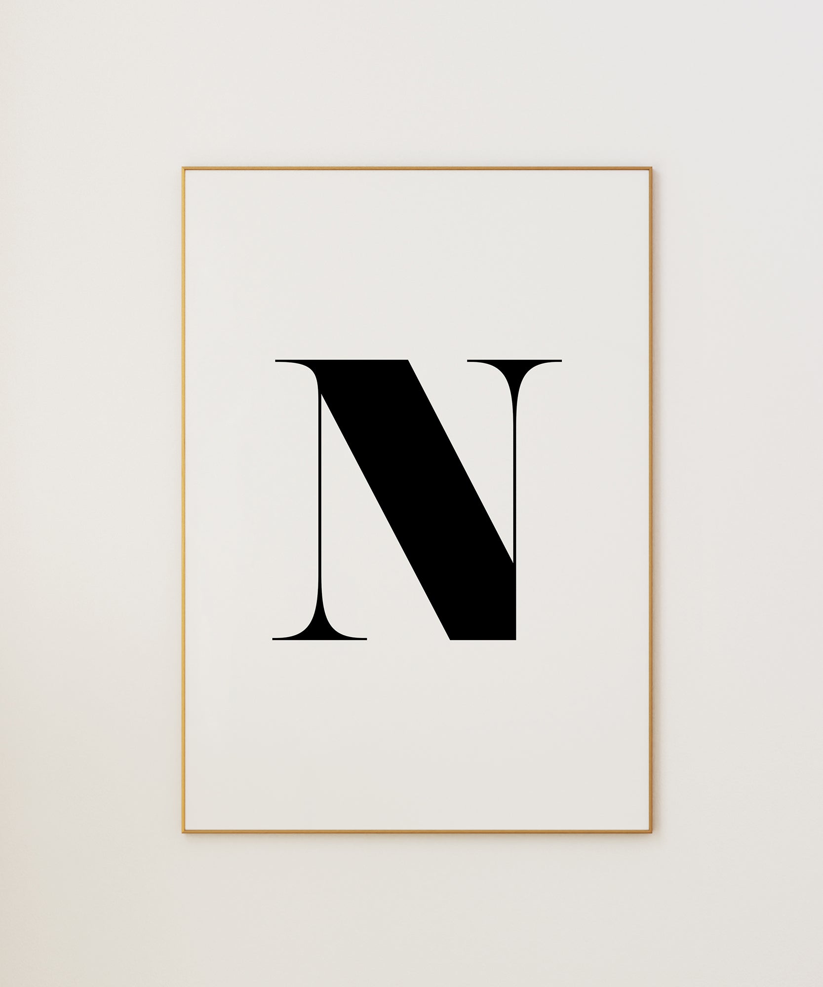 Bold black and white 'N LETTER B&W' initial, framed wall art prints for a sophisticated aesthetic.