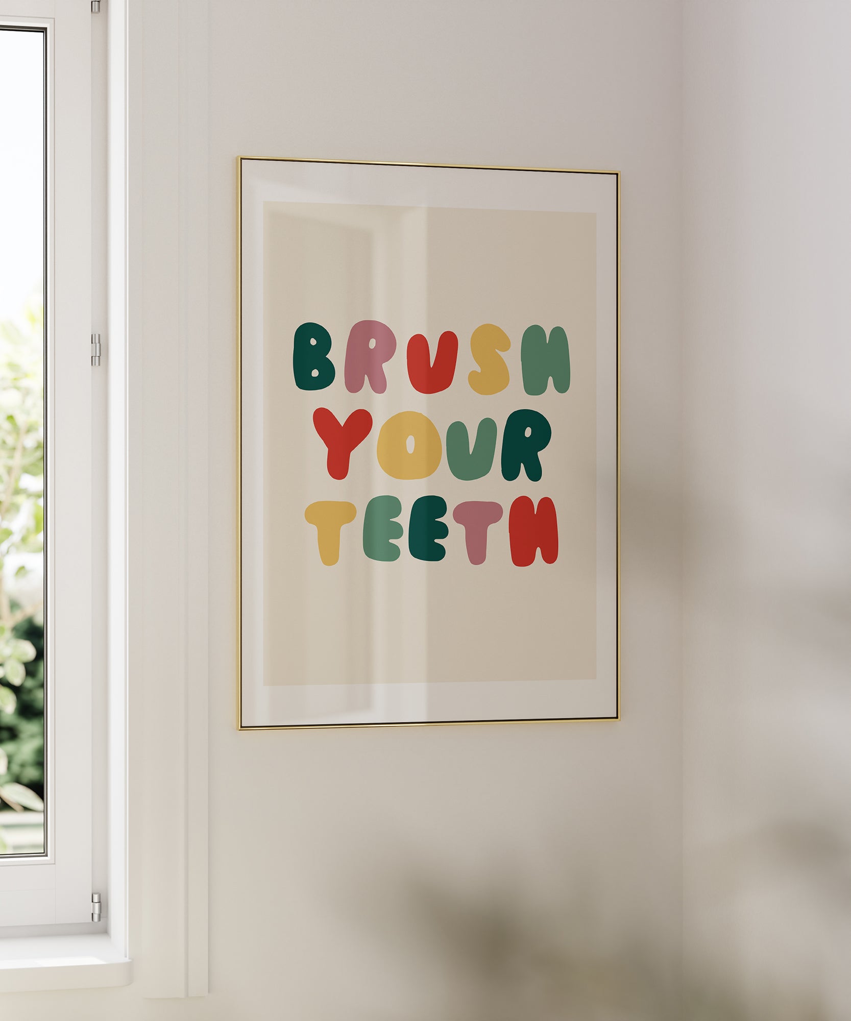 Brush Your Teeth' humorous typography print, fun framed wall art for a modern bathroom aesthetic.