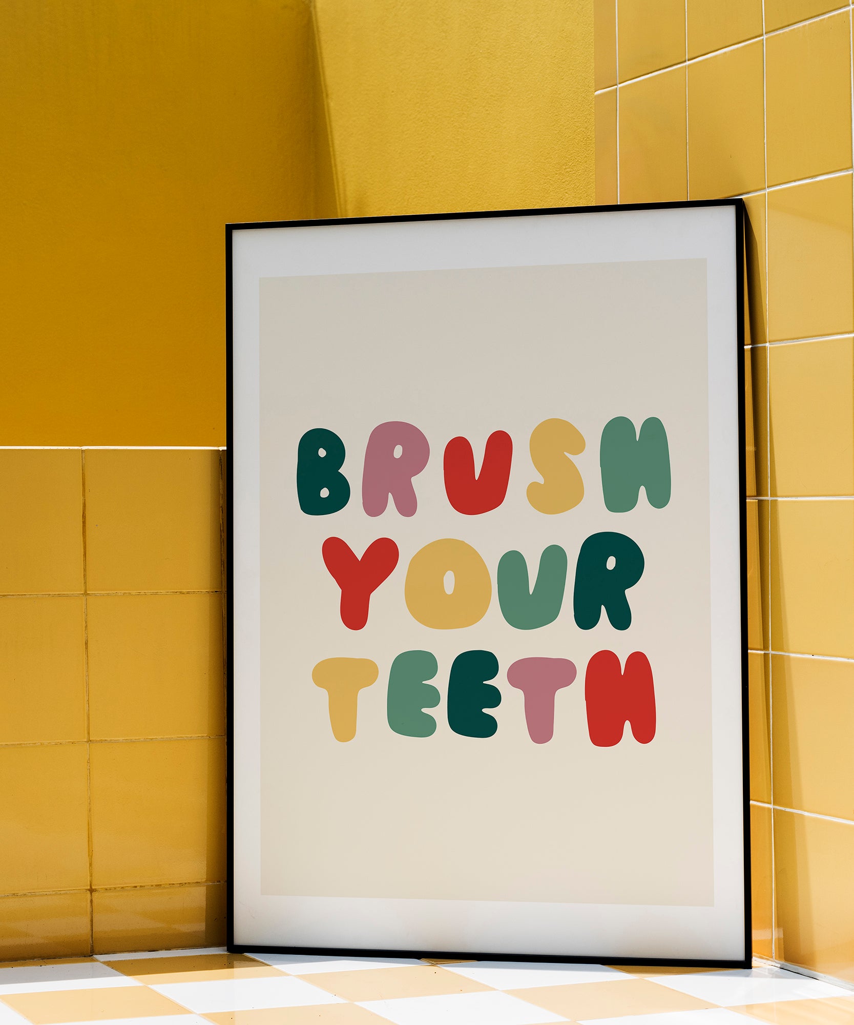 Brush Your Teeth' humorous typography print, fun framed wall art for a modern bathroom aesthetic.