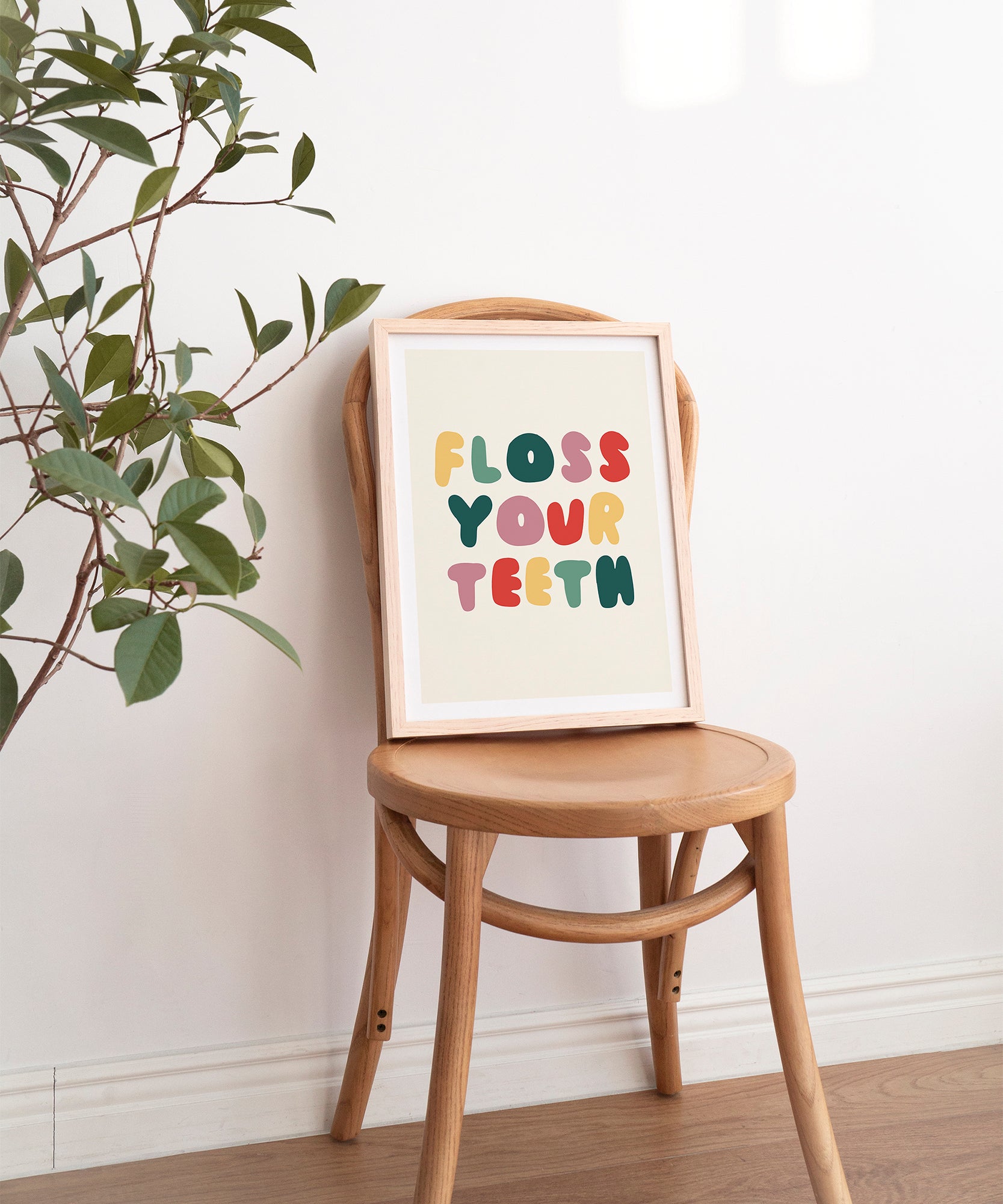 Floss Your Teeth' quirky typography, minimalist wall art for a fun bathroom aesthetic.