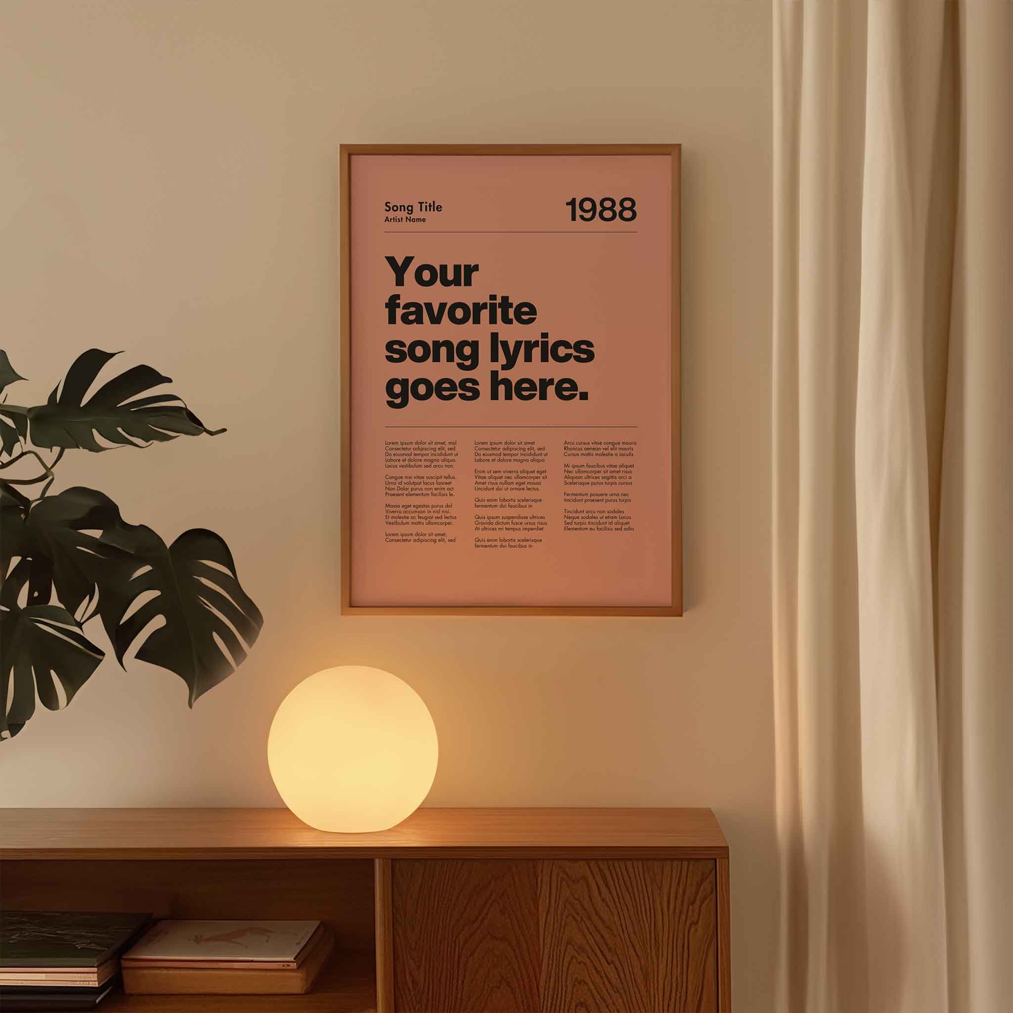 a poster hanging on a wall next to a plant