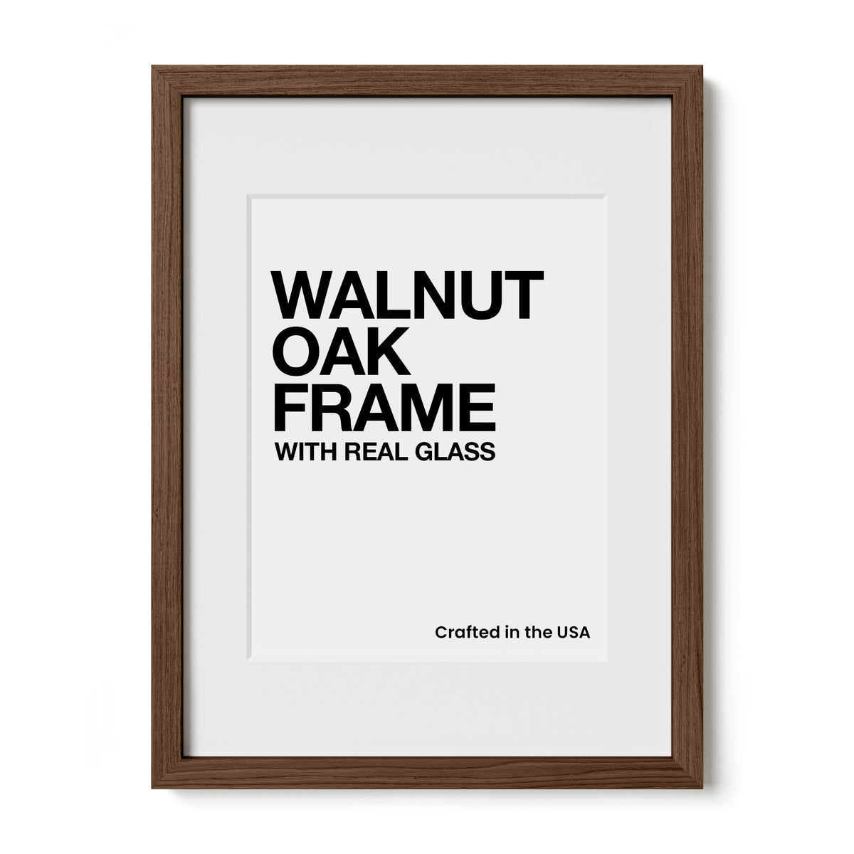 a framed piece of art with the text "WALNUT OAK FRAME WITH REAL GLASS" prominently displayed on it.