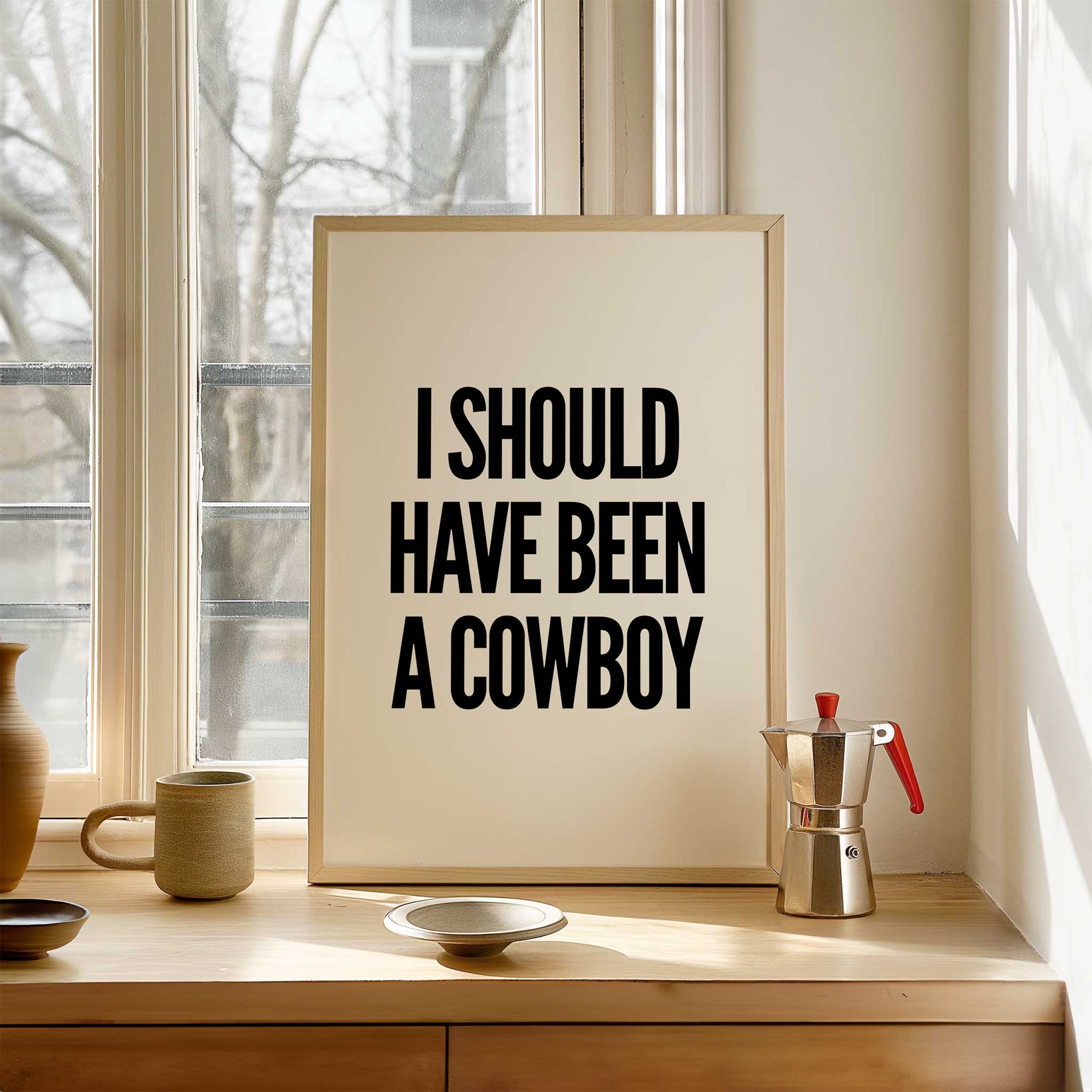I Should Have Been a Cowboy' western typography, minimalist wall art for a fun aesthetic, titled 'I Should Have Been a Cowboy'