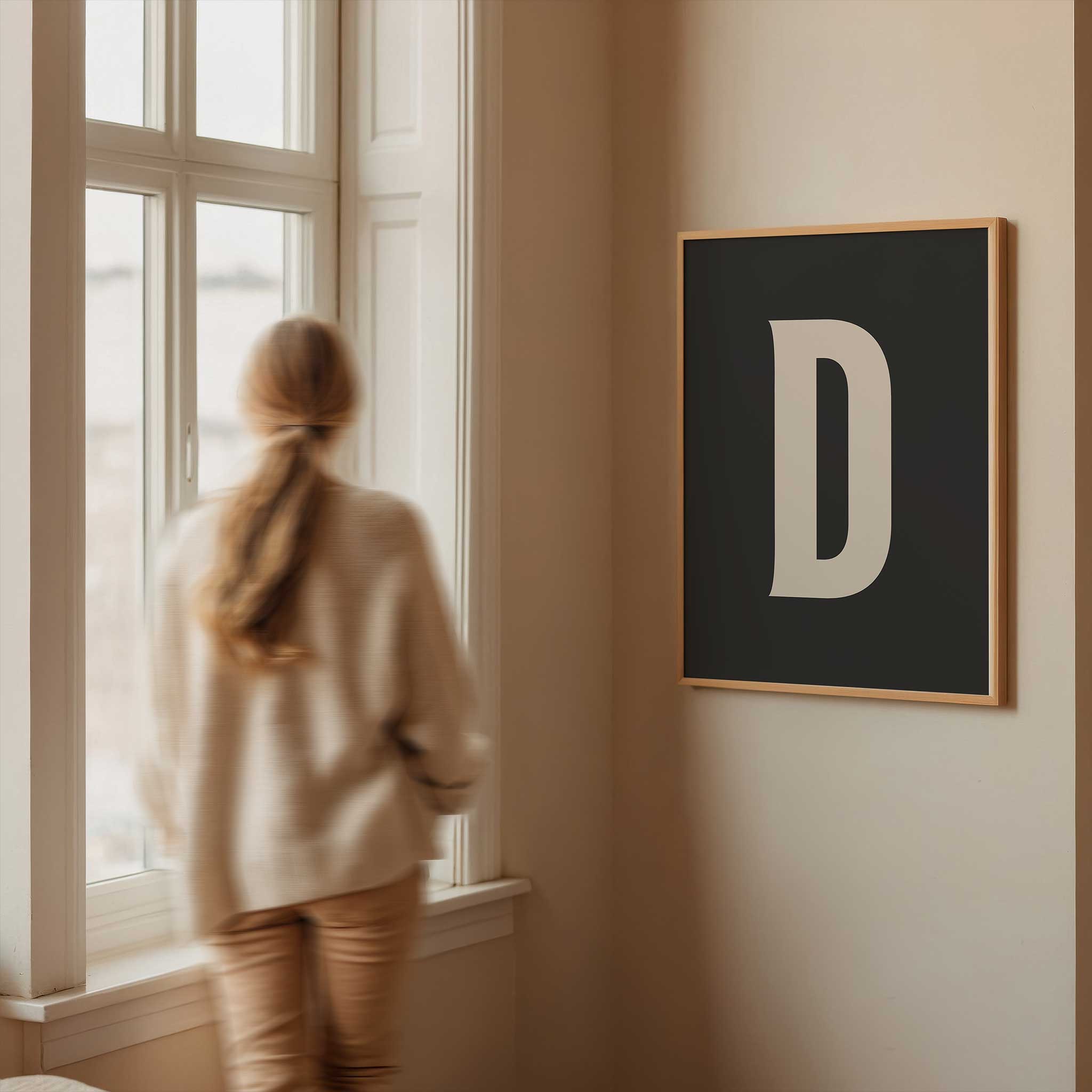 Elegant black letter 'D' monogram, minimalist wall art for a graphic aesthetic, titled 'Modern Monogram Art Print - D Black'