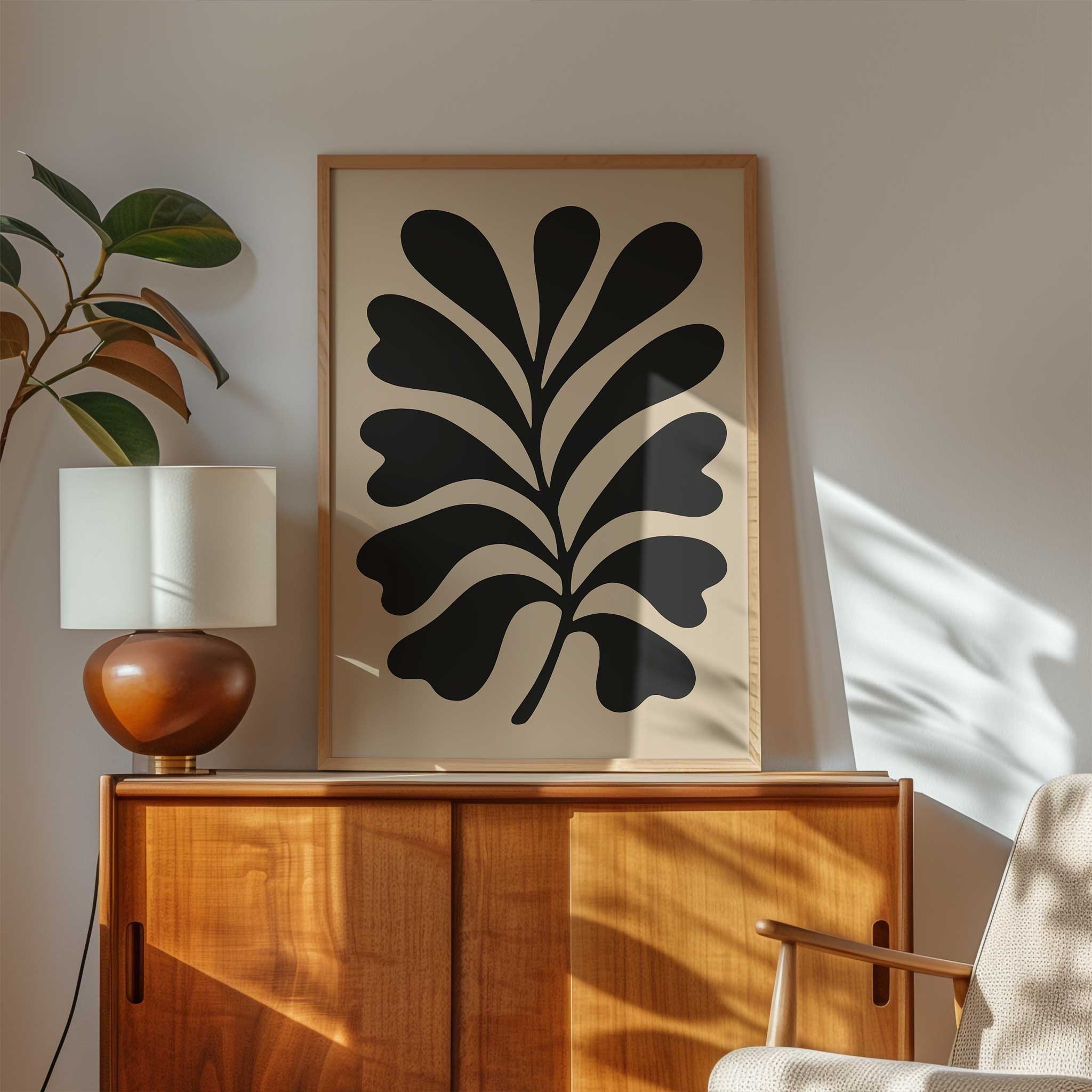 A bold, minimalist silhouette print of an oak leaf, calming modern wall art titled 'Bold Oak'.