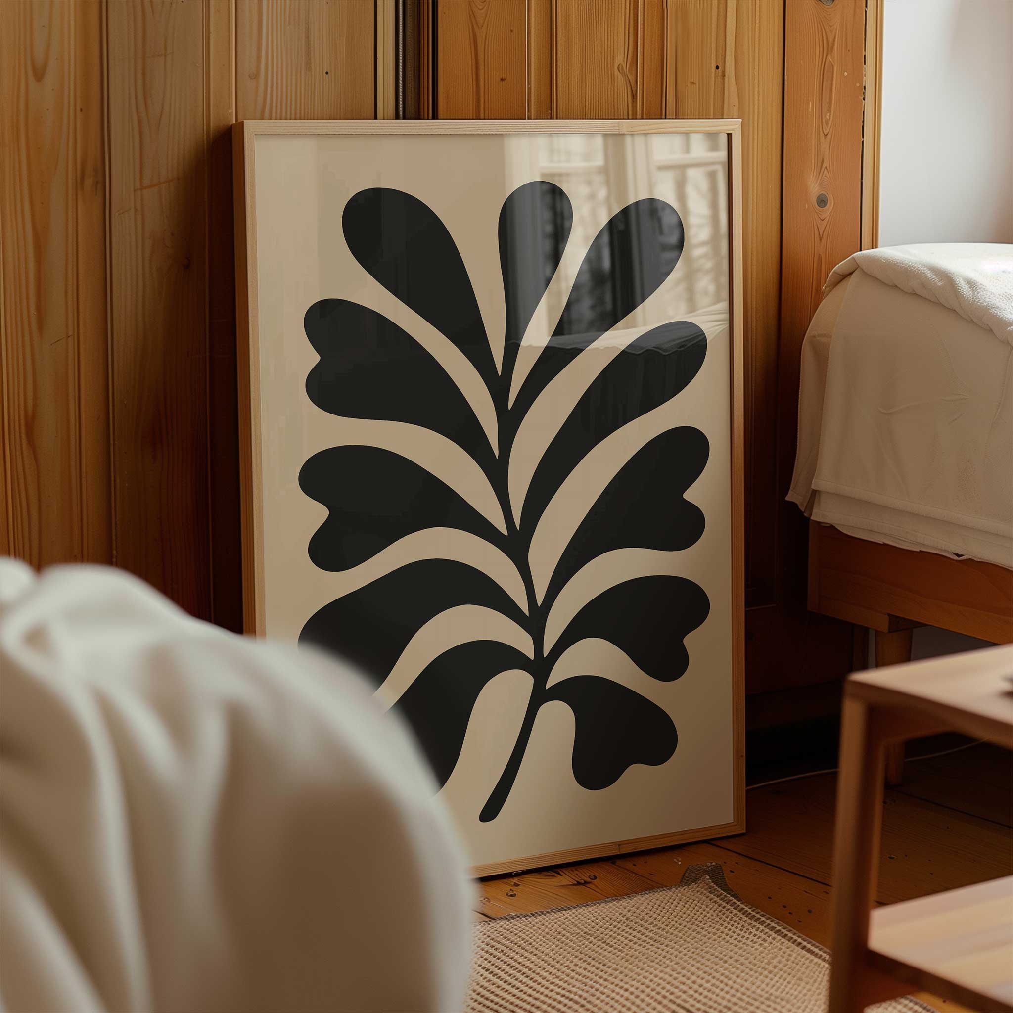 A bold, minimalist silhouette print of an oak leaf, calming modern wall art titled 'Bold Oak'.
