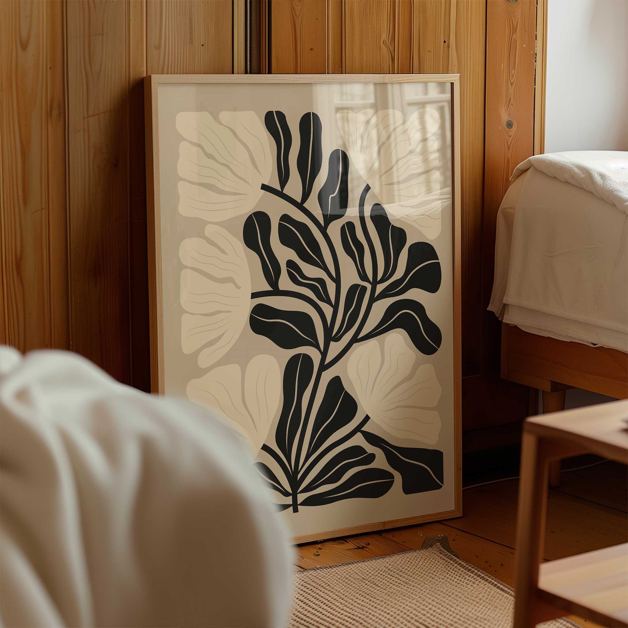 A neutral-toned minimalist print of a flowing floral silhouette, titled 'Soft Bloom'.