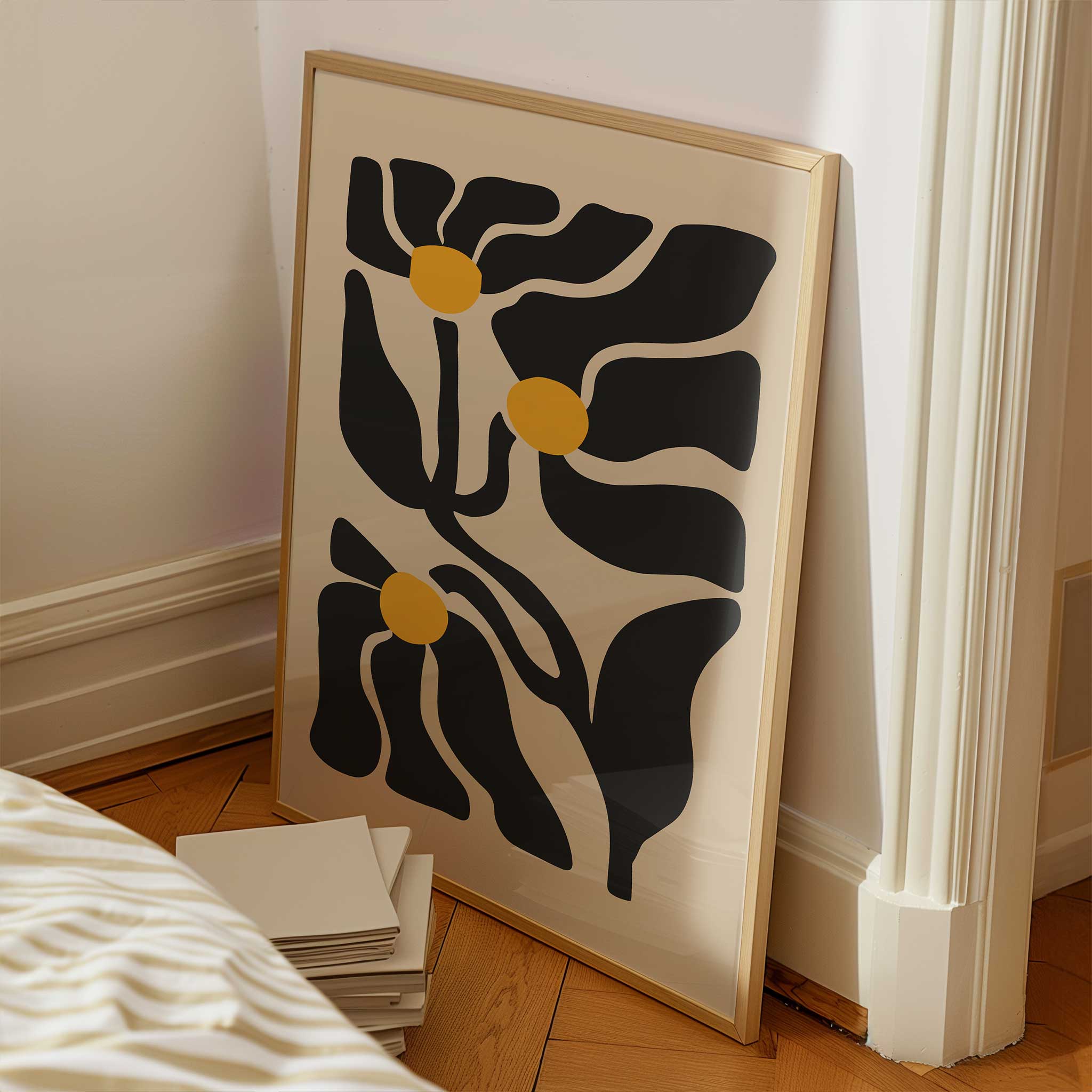 An expressive minimalist print of three abstract golden floral blossoms on flowing stems.