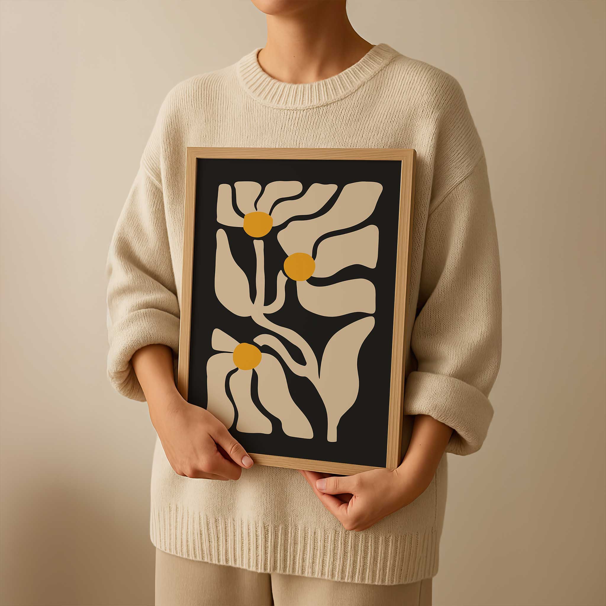 Three abstract golden floral shapes glowing against a deep black background, a high-contrast botanical print.