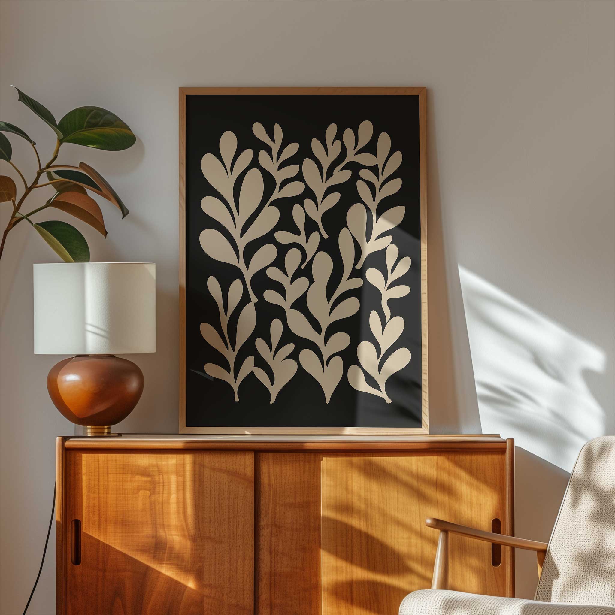 A rhythmic pattern of abstract botanical leaf silhouettes against a black background.