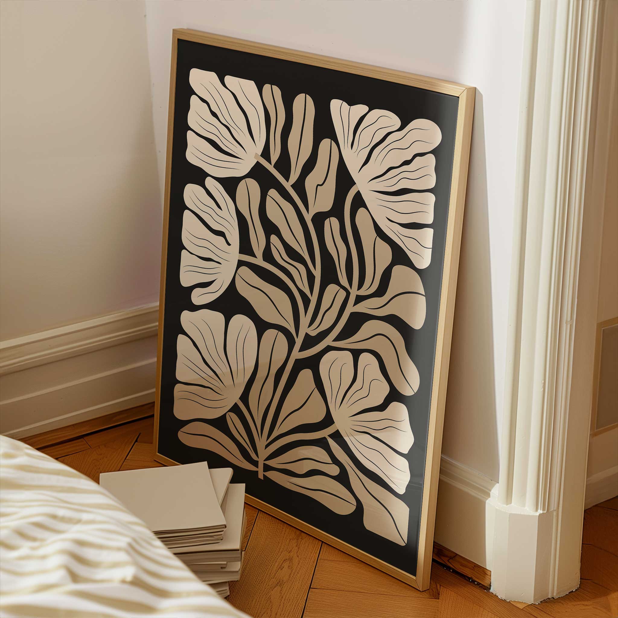 An elegant minimalist print of overlapping ginkgo leaves in warm neutral and beige tones.