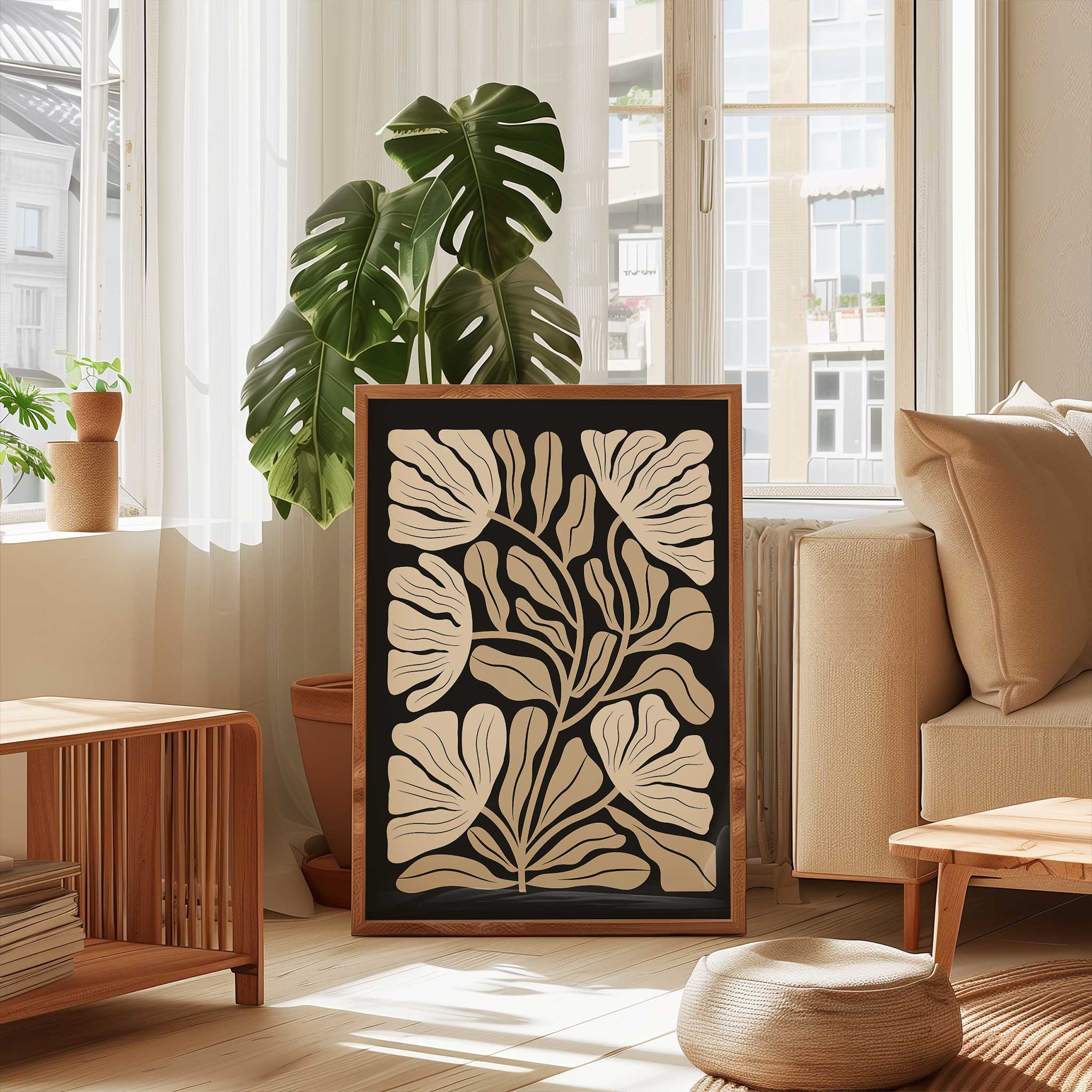 An elegant minimalist print of overlapping ginkgo leaves in warm neutral and beige tones.