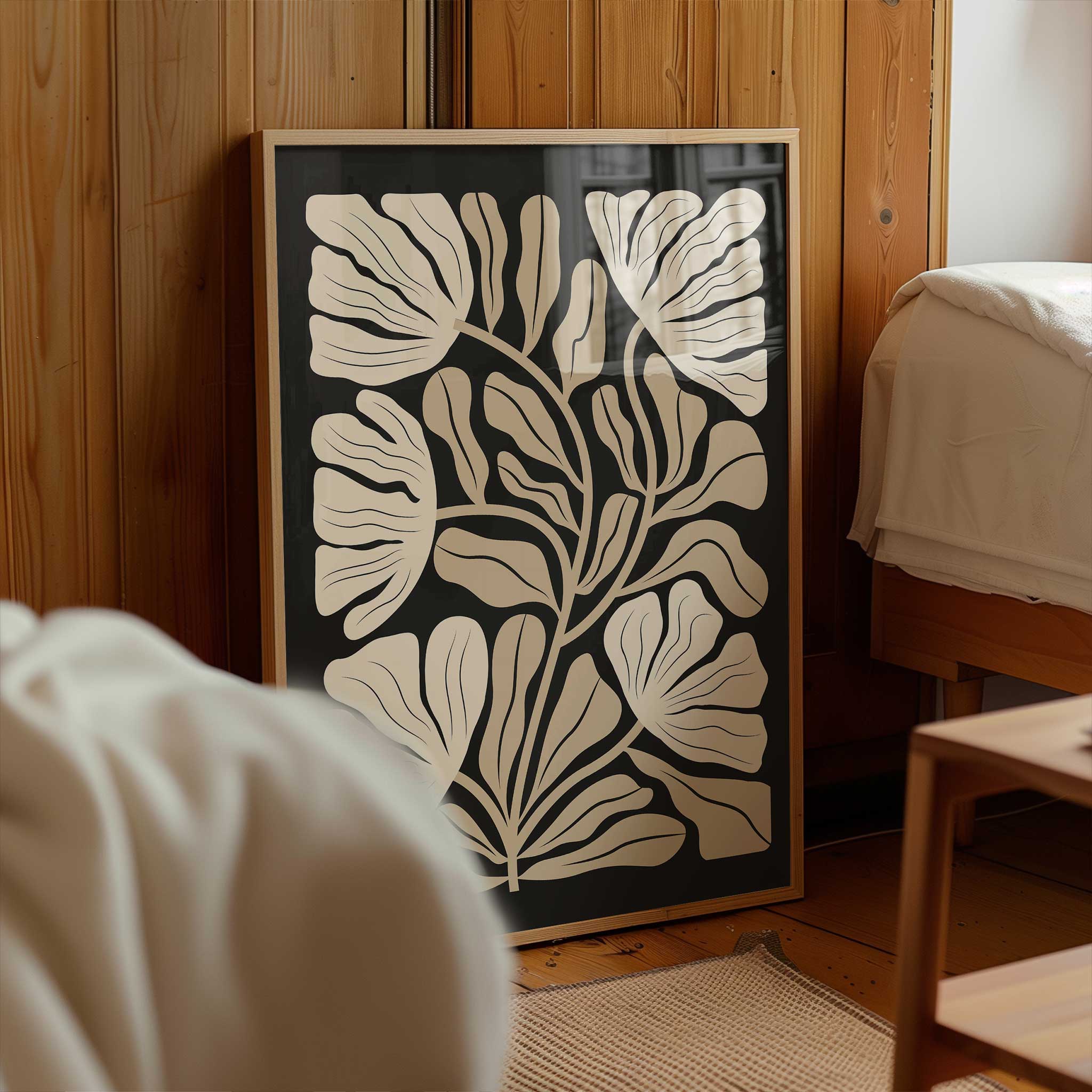 An elegant minimalist print of overlapping ginkgo leaves in warm neutral and beige tones.