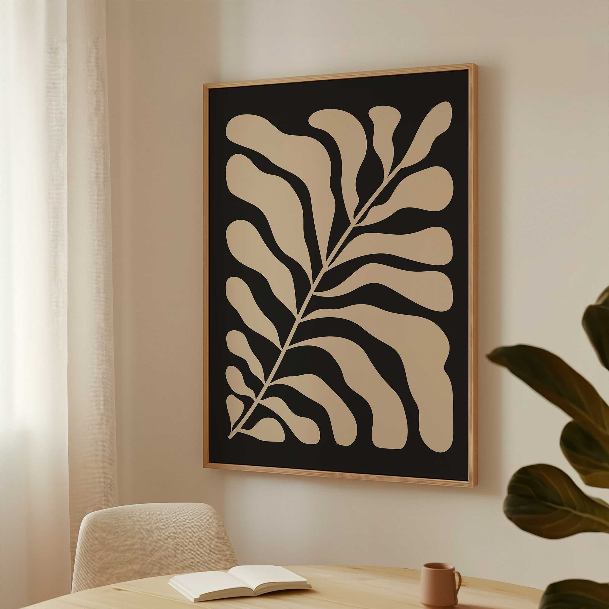 A minimalist print of flowing beige botanical leaves against a solid black background.