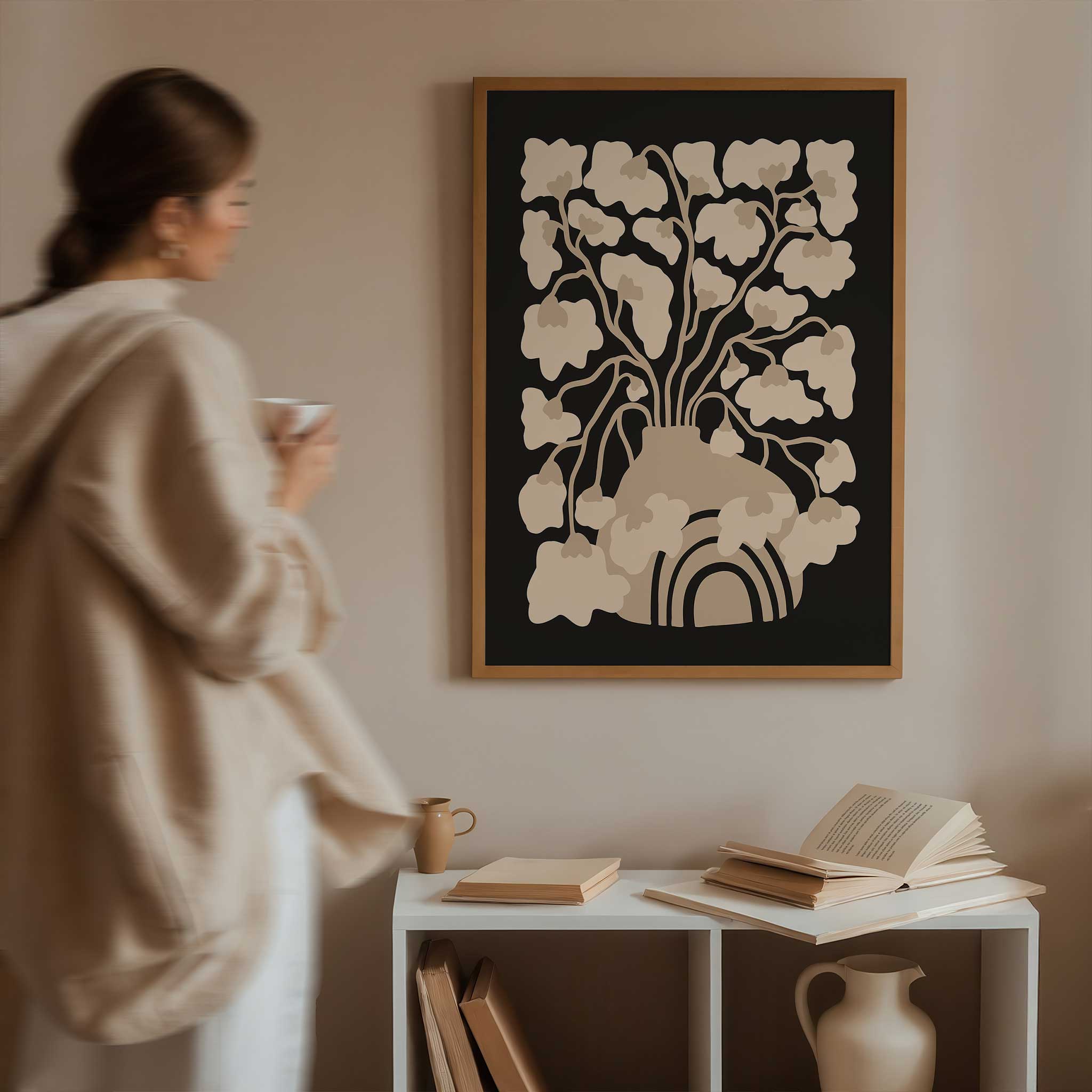 A minimalist art print of an abstract floral arrangement in a vase, in soft, neutral, earthy tones.