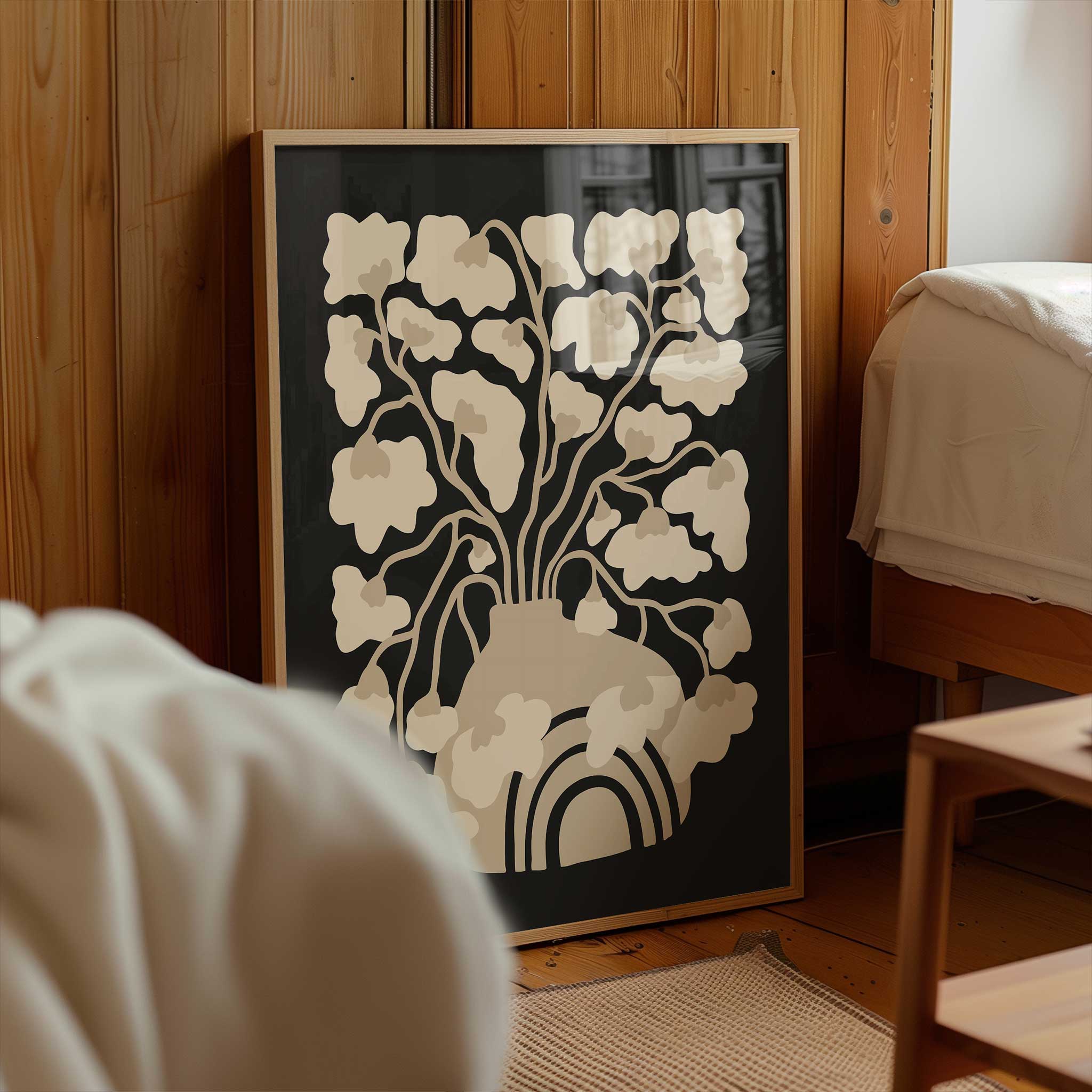 A minimalist art print of an abstract floral arrangement in a vase, in soft, neutral, earthy tones.
