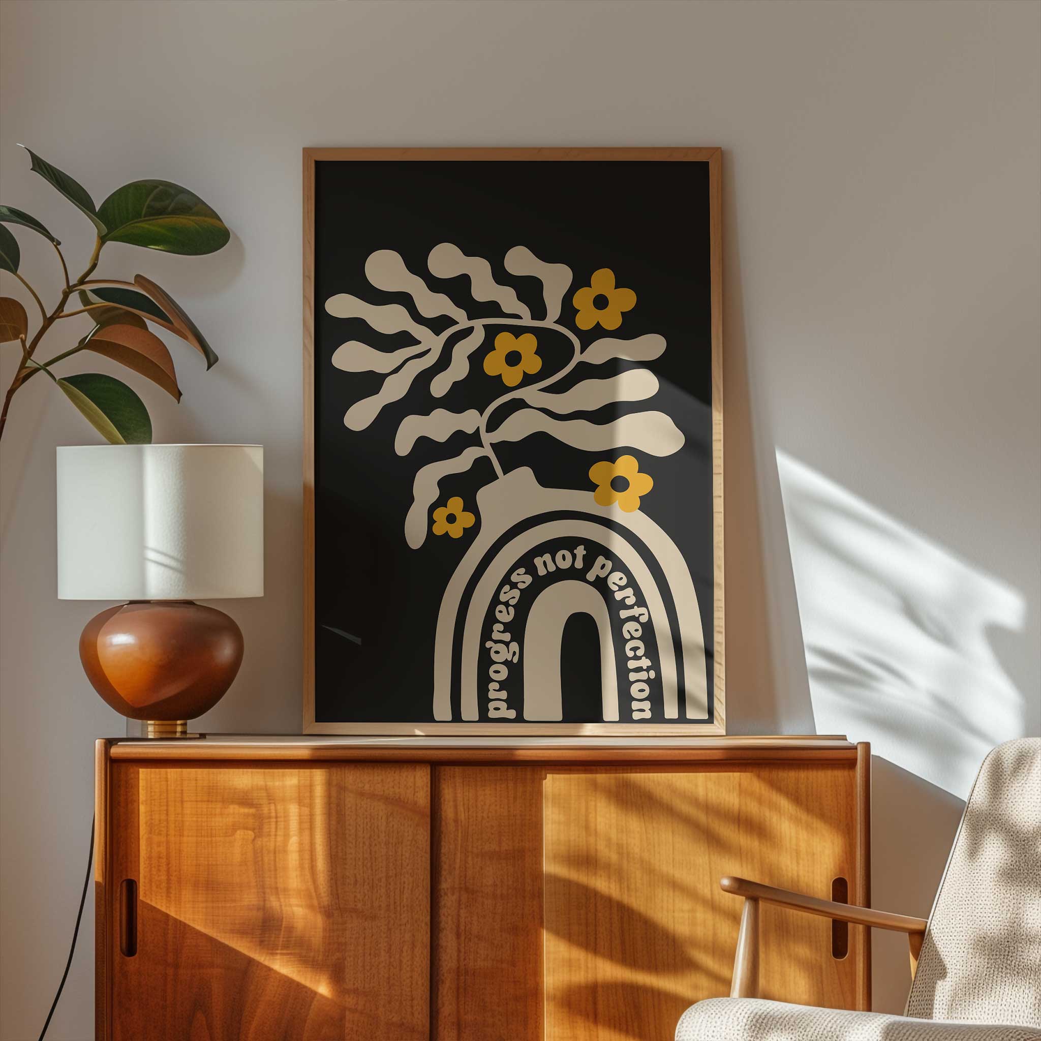 A motivational print blending playful floral shapes and a retro vase with the quote 'Progress Not Perfection'.