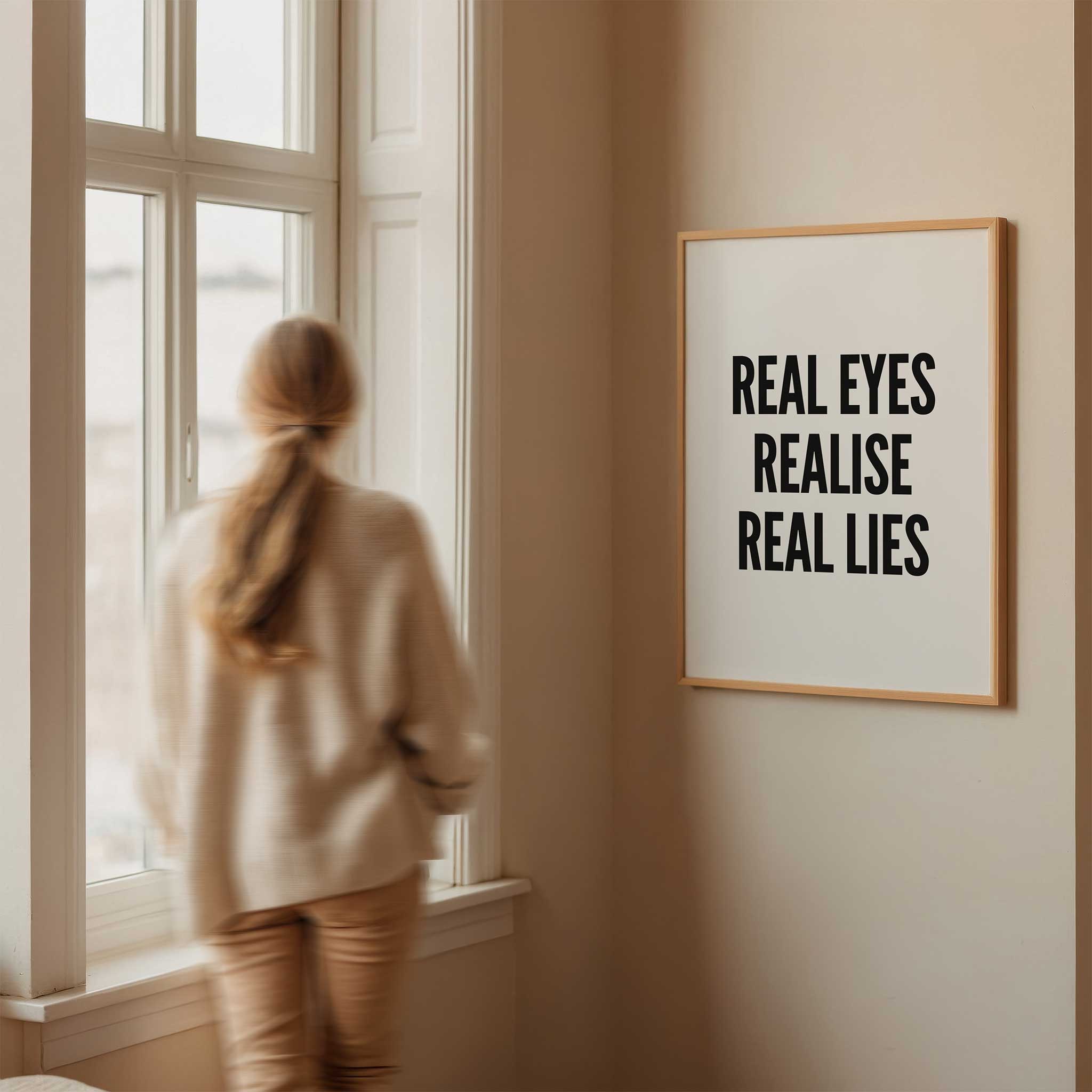 Real Eyes Realise Real Lies' clever typography, modern wall art for a thought-provoking aesthetic, titled 'Real Eyes Realise Real Lies'
