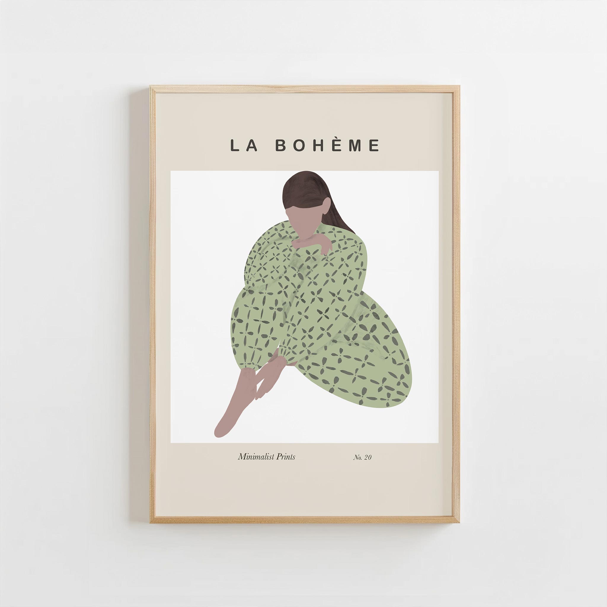Framed artwork of a woman in a green dress with 'La Bohème' text on a white background