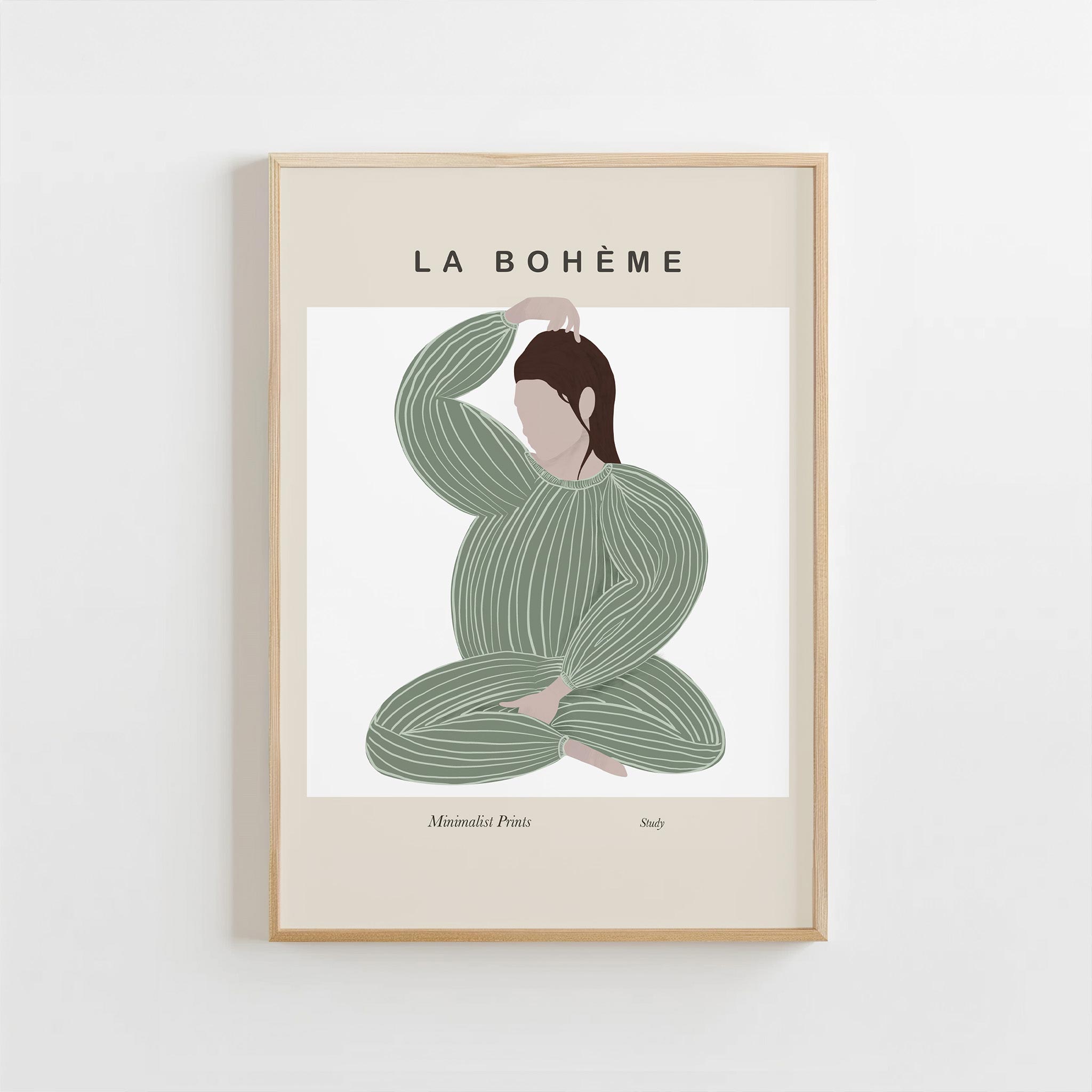 Framed artwork of a woman in a green dress with 'La Bohème' text on a white background